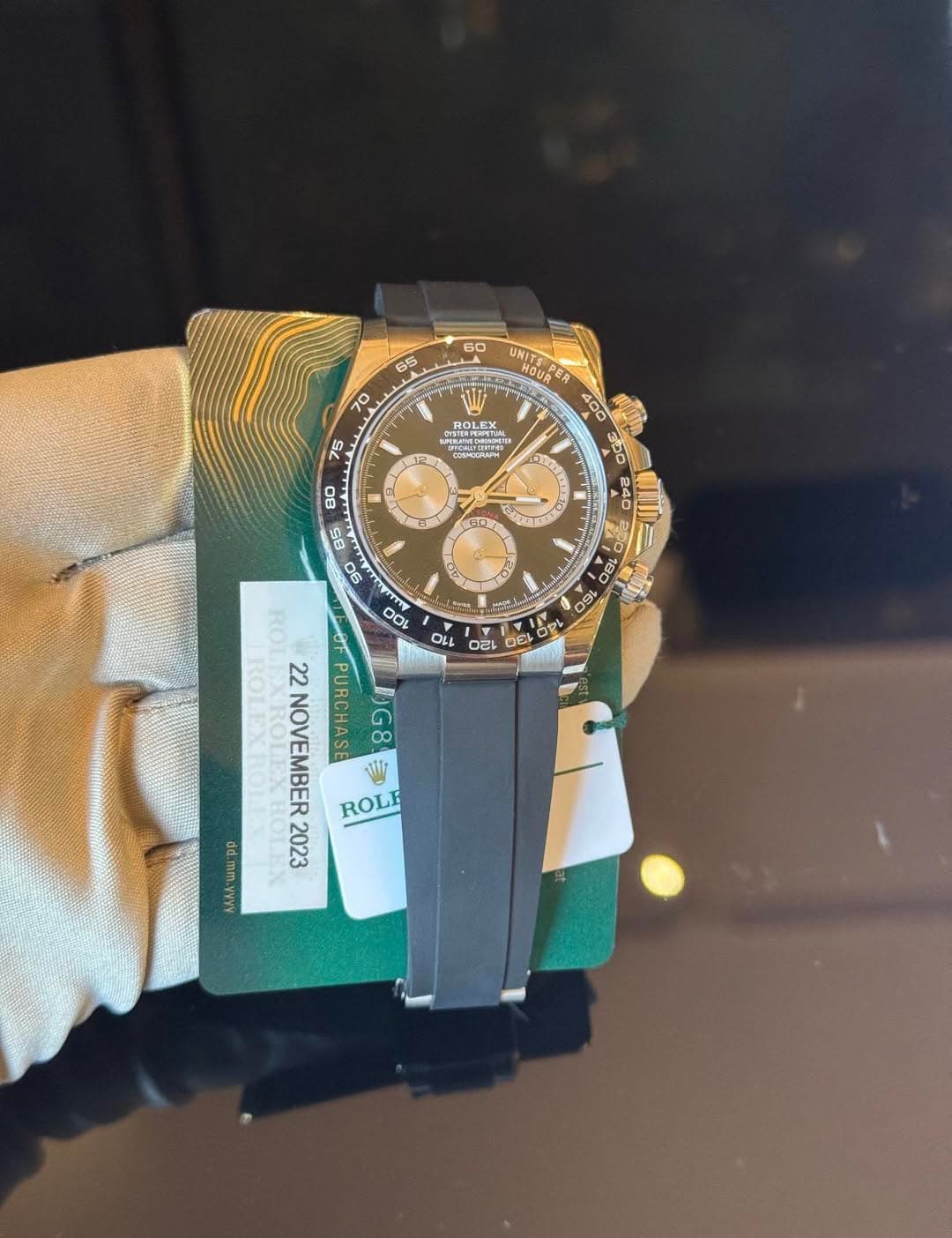 May be an image of wrist watch and text
