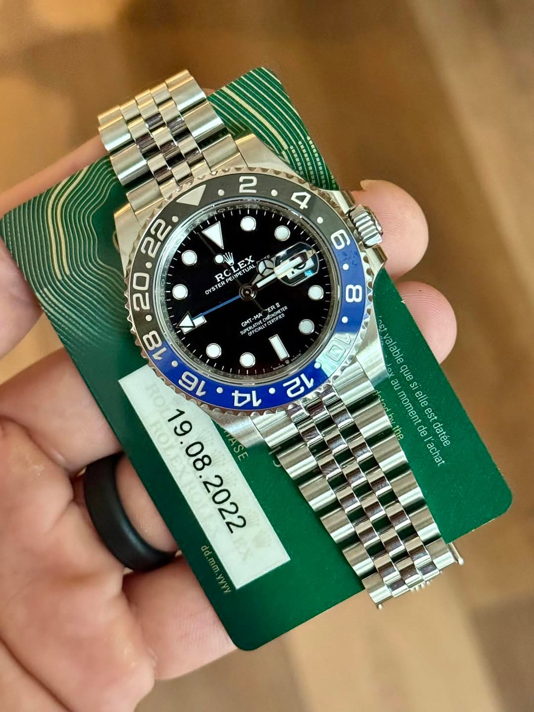 May be an image of wrist watch and text