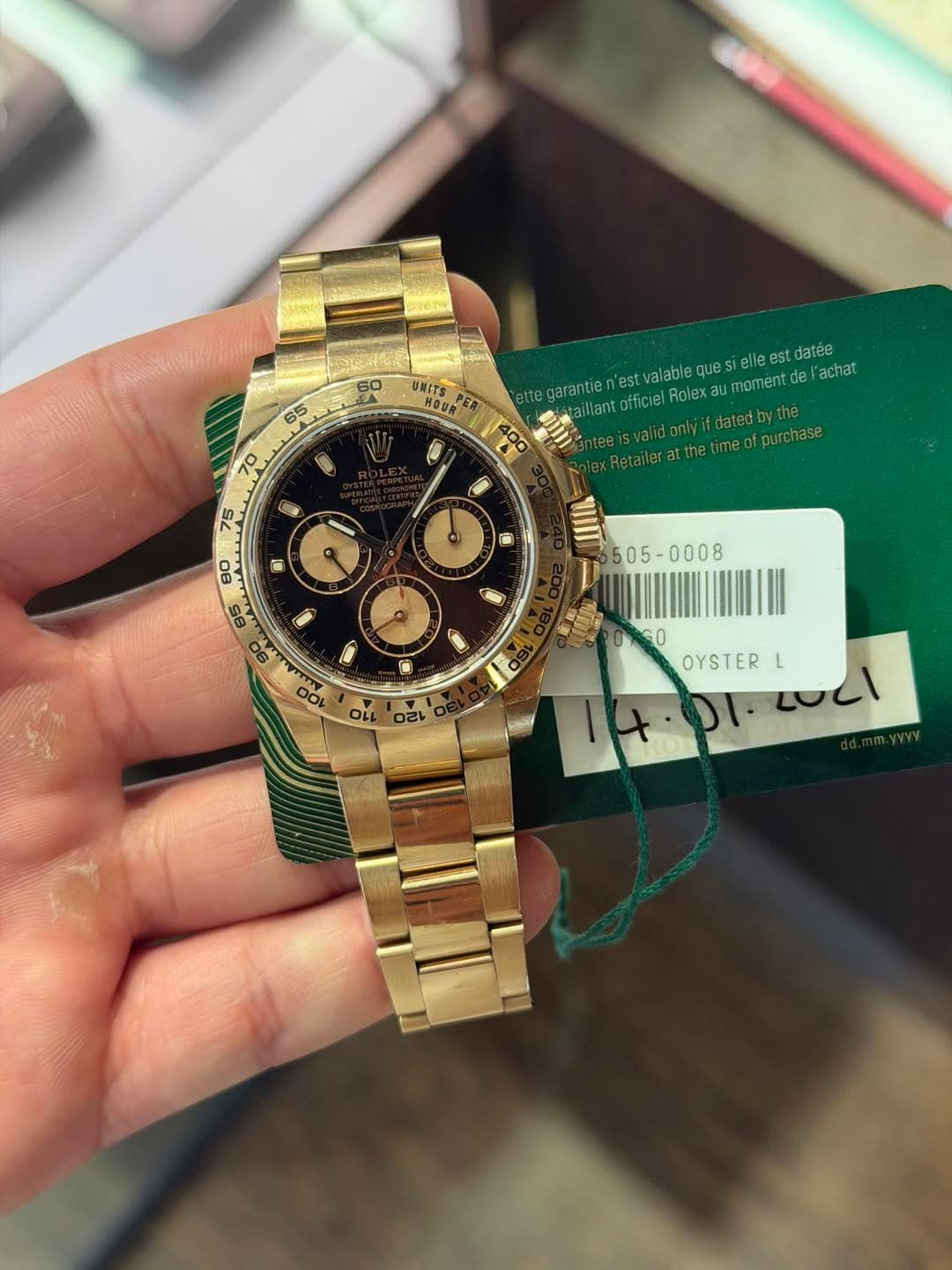 May be an image of wrist watch and text