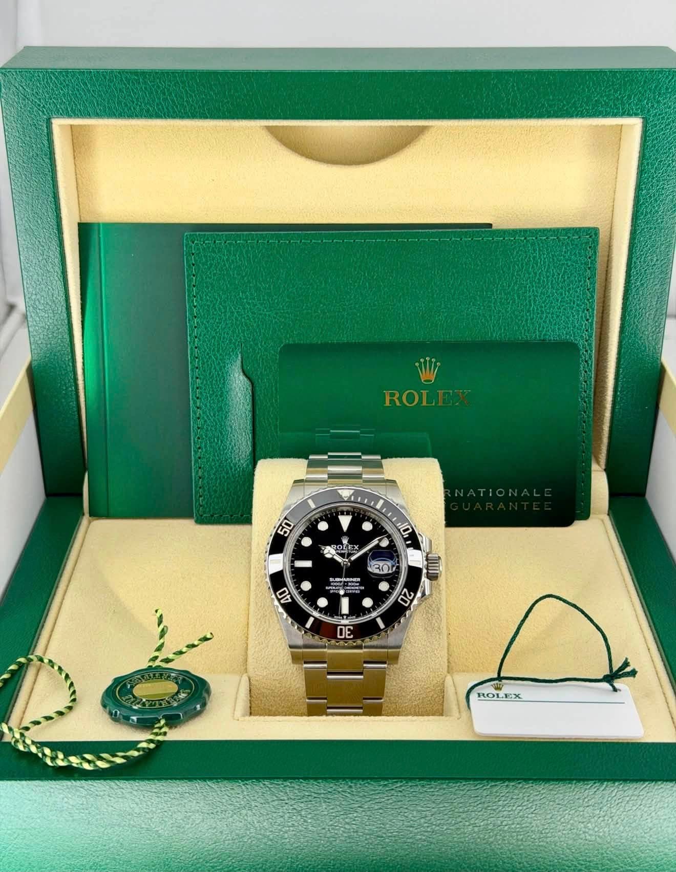 May be an image of wrist watch and text that says 'W ROLEX 50 0 + LEX 10 עחגי 店 HARHE たー0 20 40 E ROL ROLEX'