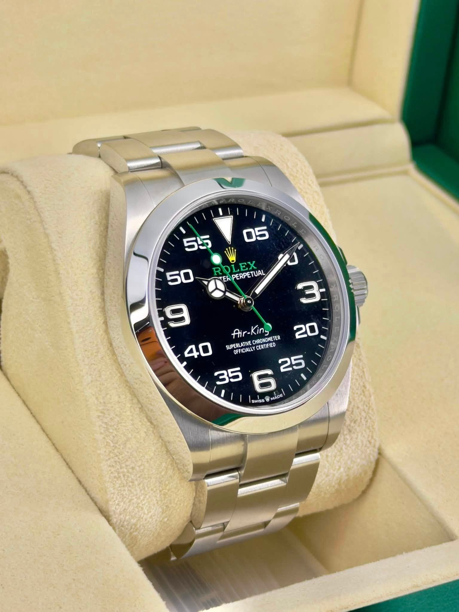 May be an image of wrist watch and text that says '05 55 RD ROLEX PERPETUAL TER 3 20 50 ហ Air-King King Air 40 SIPERLATIVE CИBOMETEB OEFICINLLY CERTFIED 25 35 6 I I SASS MADE'