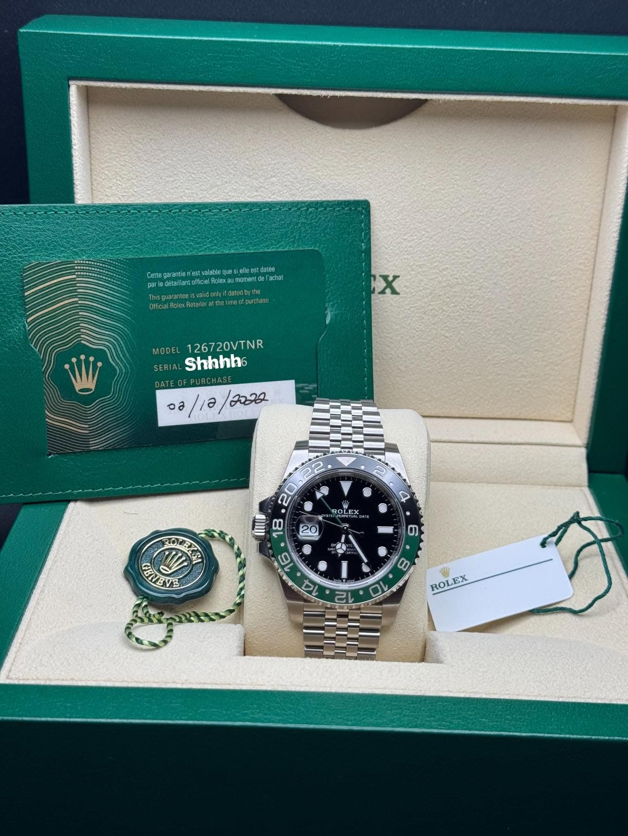 May be an image of wrist watch and text