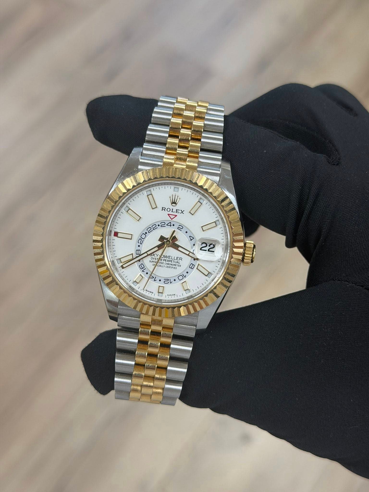 May be an image of wrist watch and text