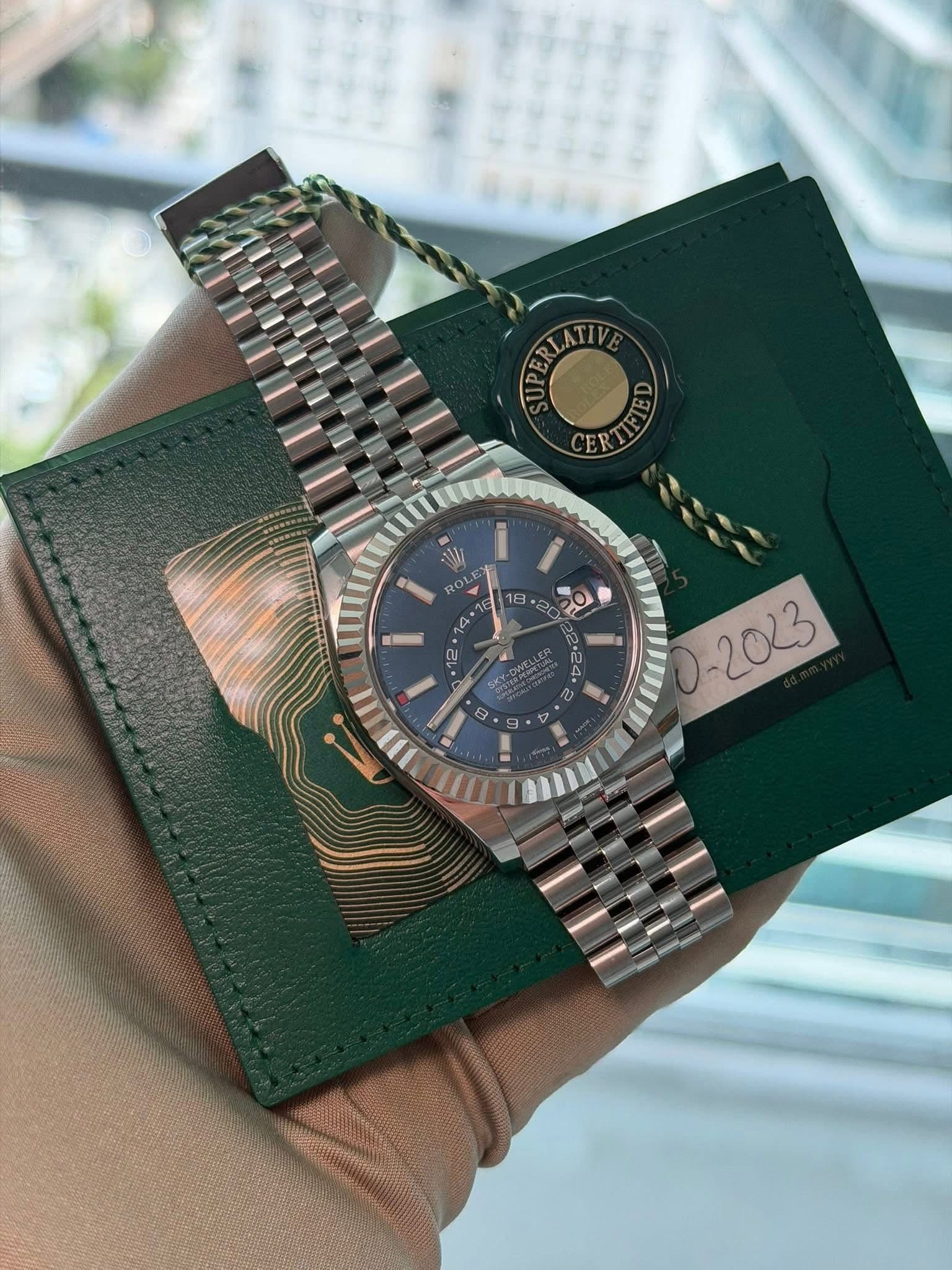 May be an image of wrist watch and text
