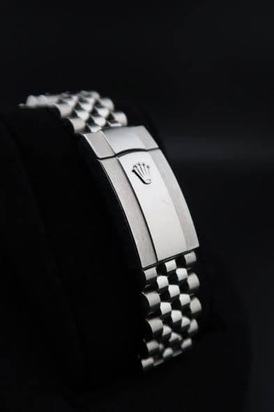 May be an image of jewelry and digital watch