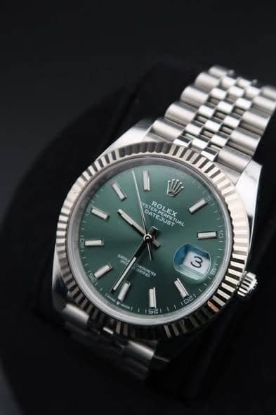 May be an image of wrist watch and text that says 'S li WI YSTERPERPETUAL DAT DATEERPETUA STERPE ROLEX 속 RPERCT ROLEXUAL JUS EJUST S PETUAL UAL 10 3 Teeca 3 16 20 ர്'