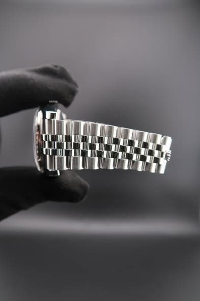 May be an image of wrist watch