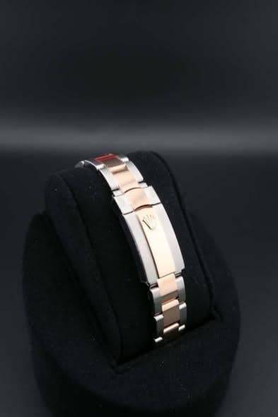 May be an image of jewelry and wrist watch