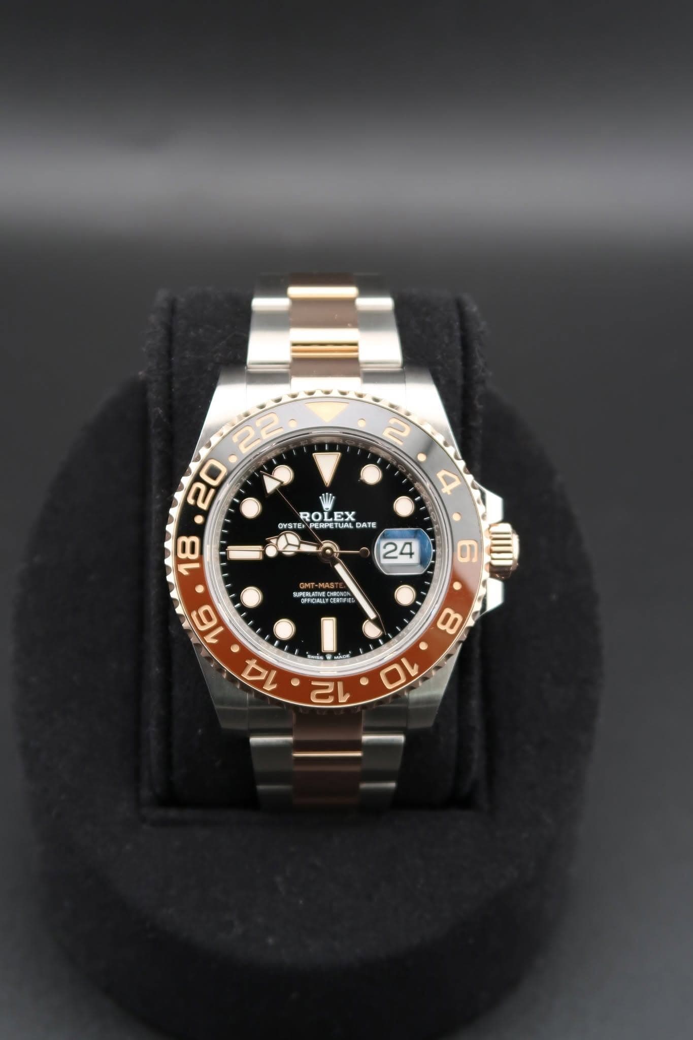 May be an image of wrist watch and text