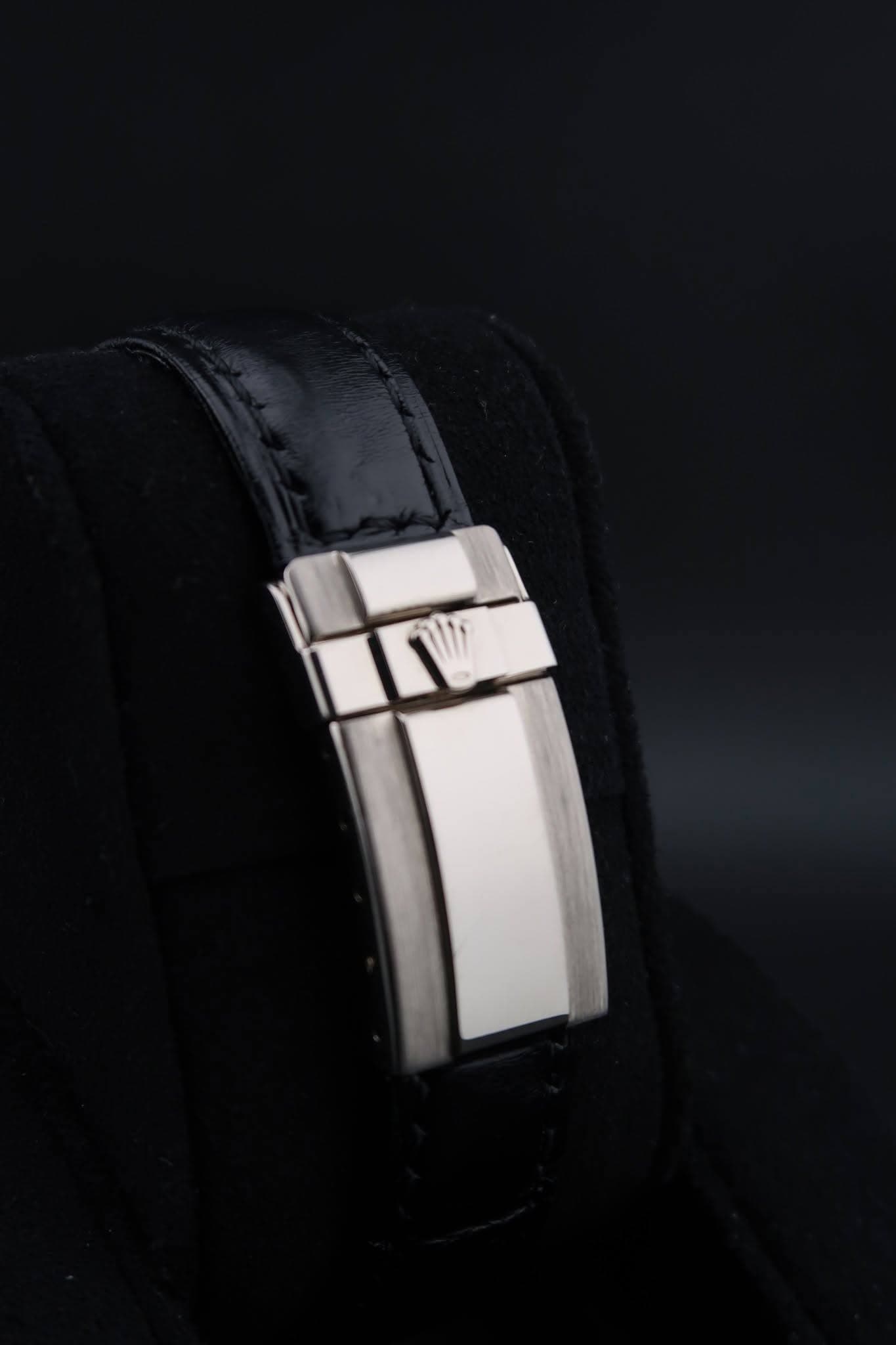 May be an image of jewelry, wrist watch and leather