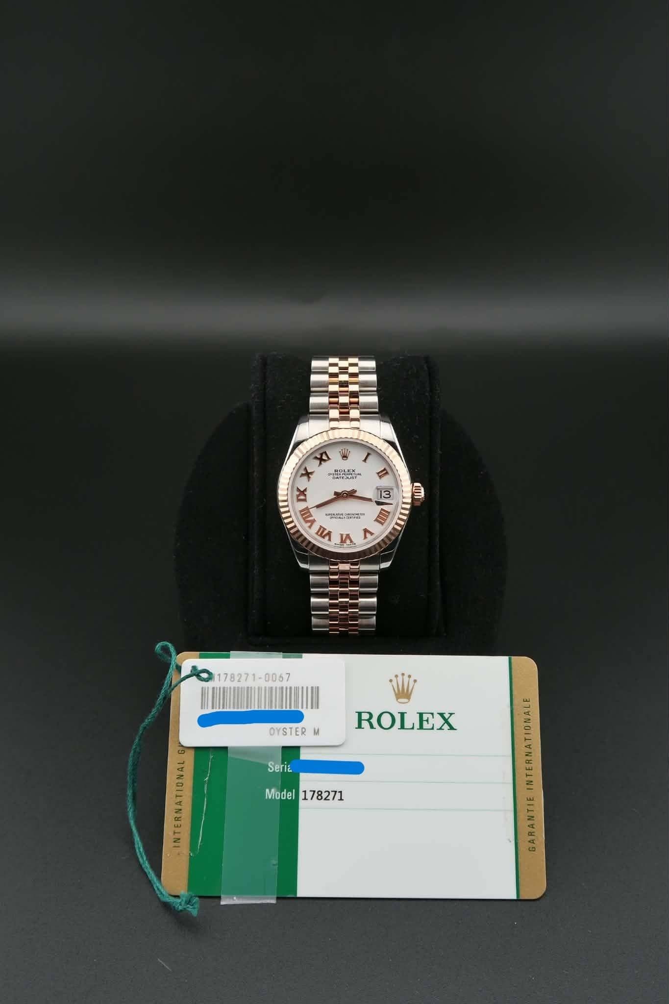 May be an image of wrist watch and text that says 'i သ်ခားတ် H반5 DK X IK I II 1 ന က S IIII . ዘለ た OYSTER M ROLEX Seria Model178271 Model 178271 INTERNATIONAL GARANTIE'