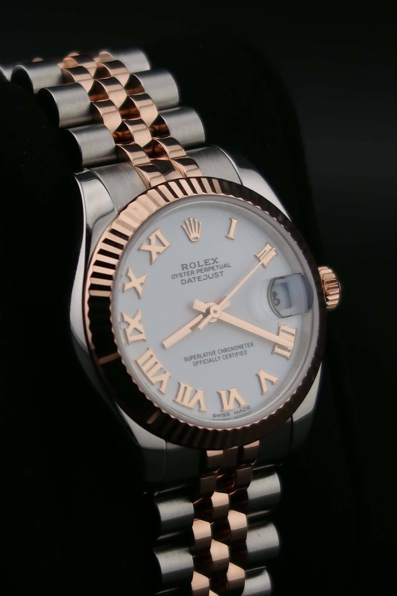 May be an image of wrist watch and text that says 'I A ATIA 三 በበ XI X ROLEX ROLEETUAL ERPETUAL OYS DATEJUST IX VIIII SUPERLATIVE OFFICIALLY CERTIFIED CHRONOMETER TI SWISS MADE 1 ٨'