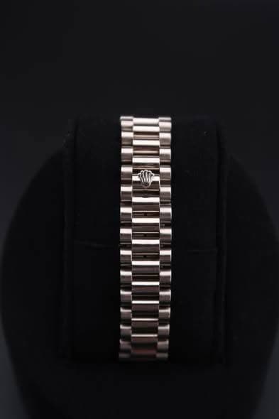 May be an image of wrist watch and jewelry