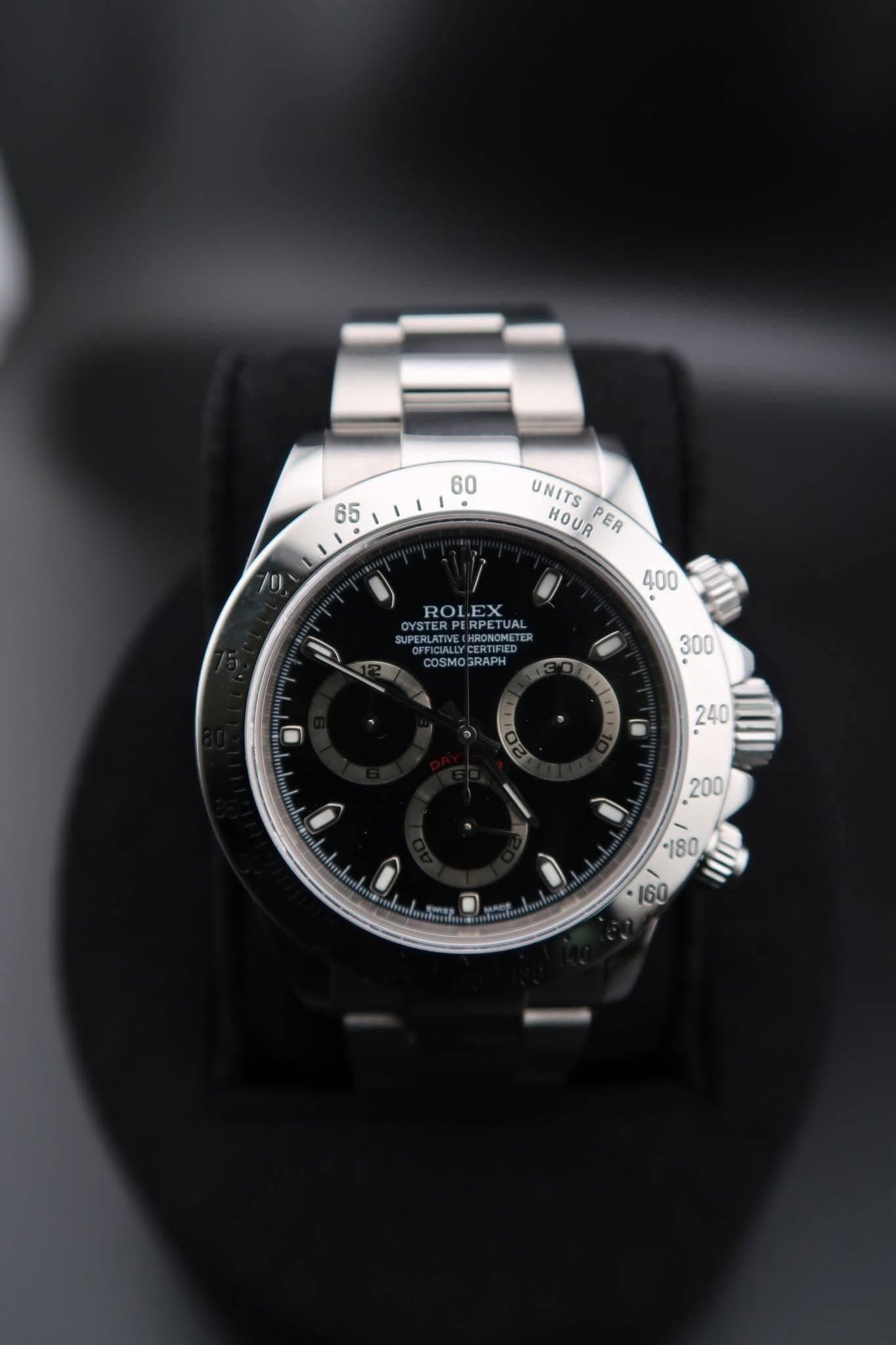 May be an image of wrist watch and text that says '60 65 UNITS HOUR PER 0 400 ROLEX ROL. OYSTER TERPERPETUAL JAL ASSICIAL SUPERLATIV CERTIFIED PERTIFED CMETE COSMO COSMO3RAPH RAPH…