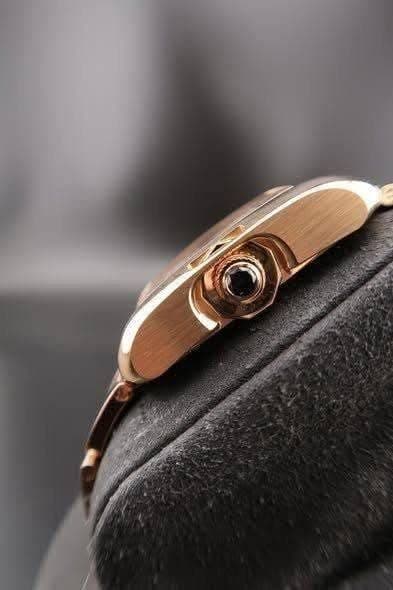 May be an image of jewelry and wrist watch