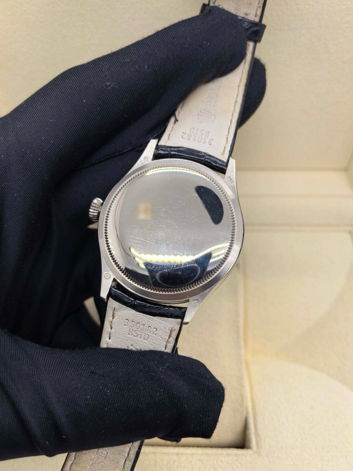 May be an image of wrist watch and text