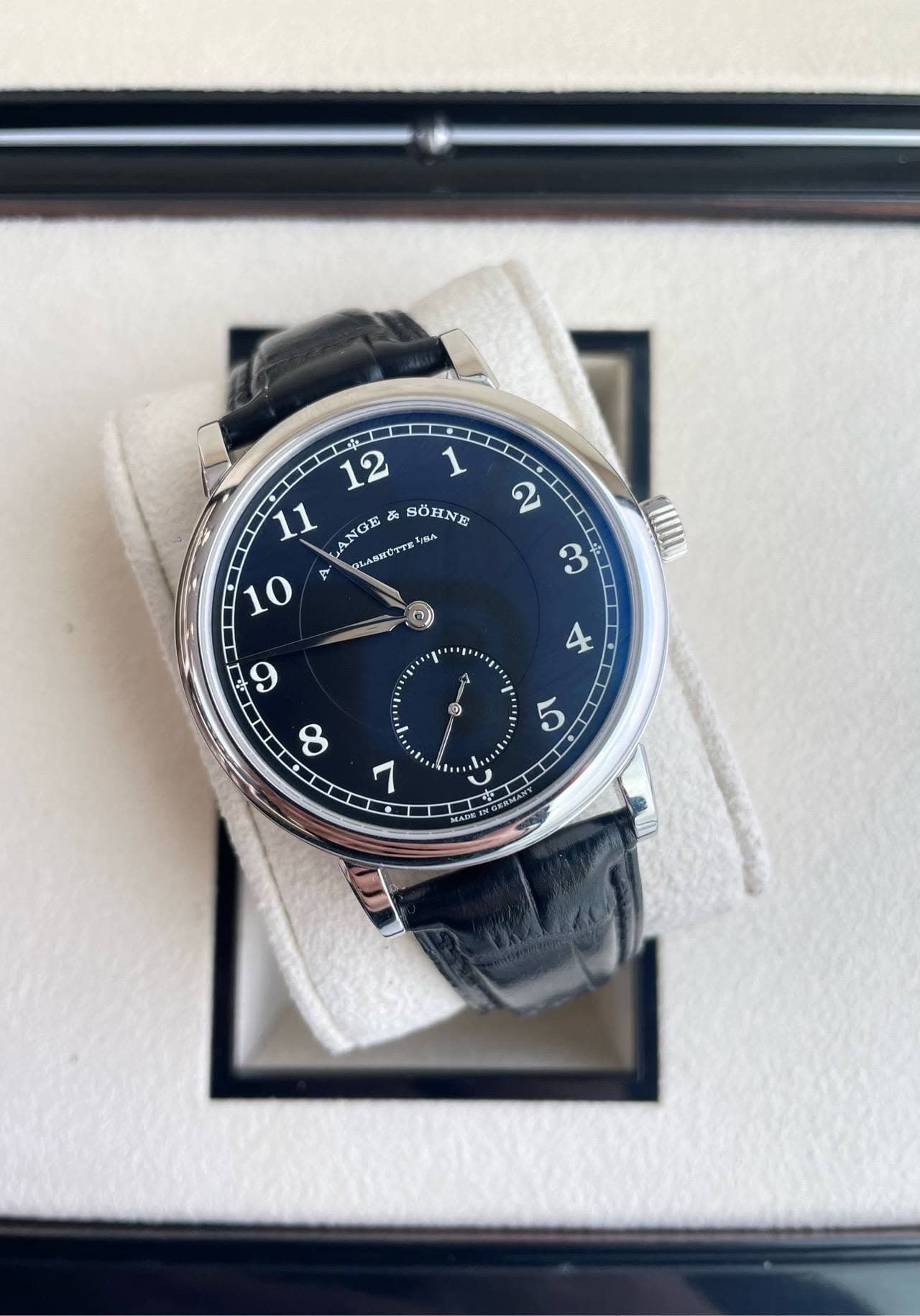 May be an image of wrist watch and text
