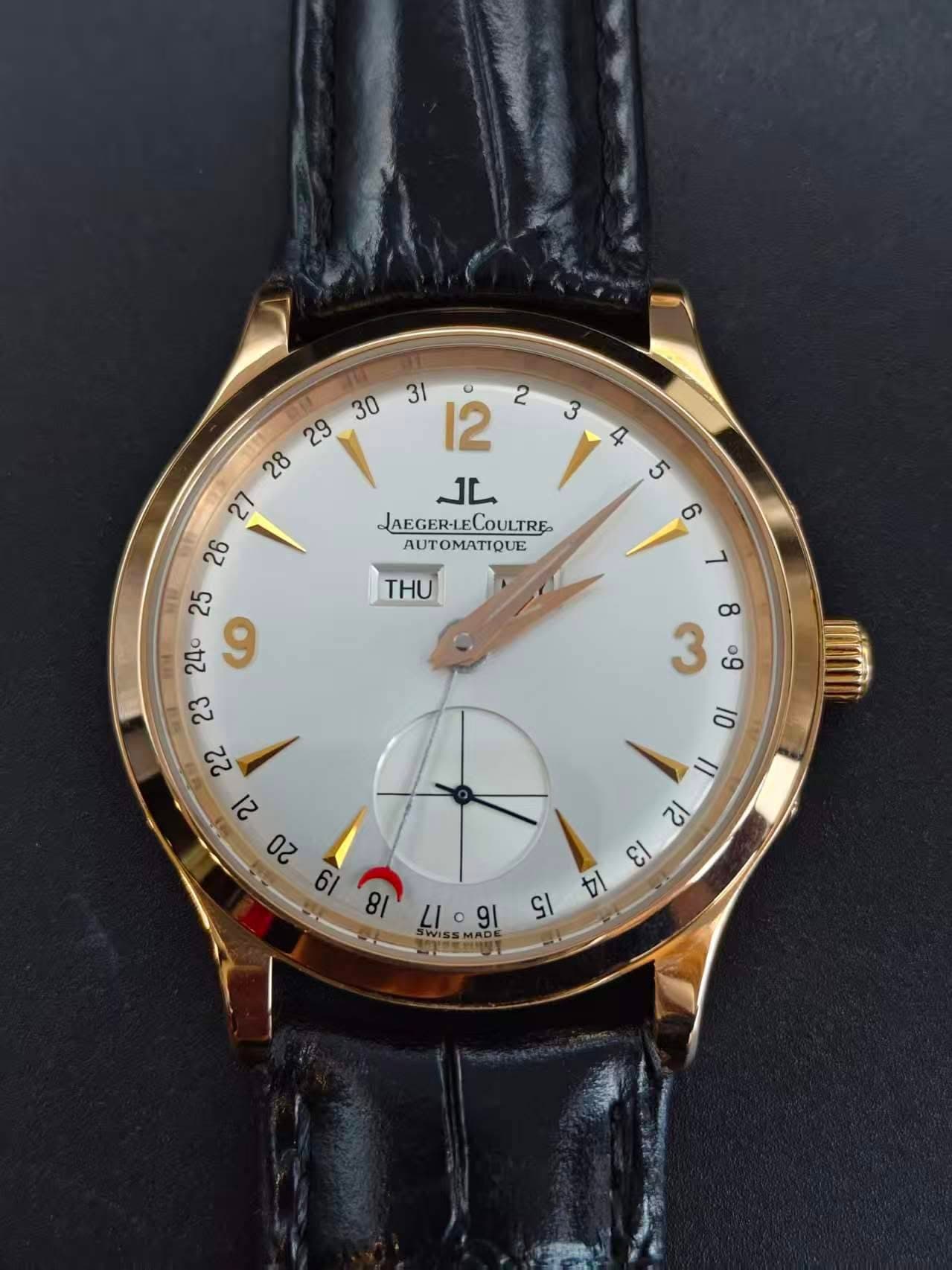 May be an image of wrist watch and text that says '2 3 31 မ 12 ٦اله JAEGER-LECOULTRE AUTOMATIQUE 4 5 THU 吃 မိ 01 Il 12 ει 미 1I LIo L1.91 91 5WISSMADE MADE SWISS'