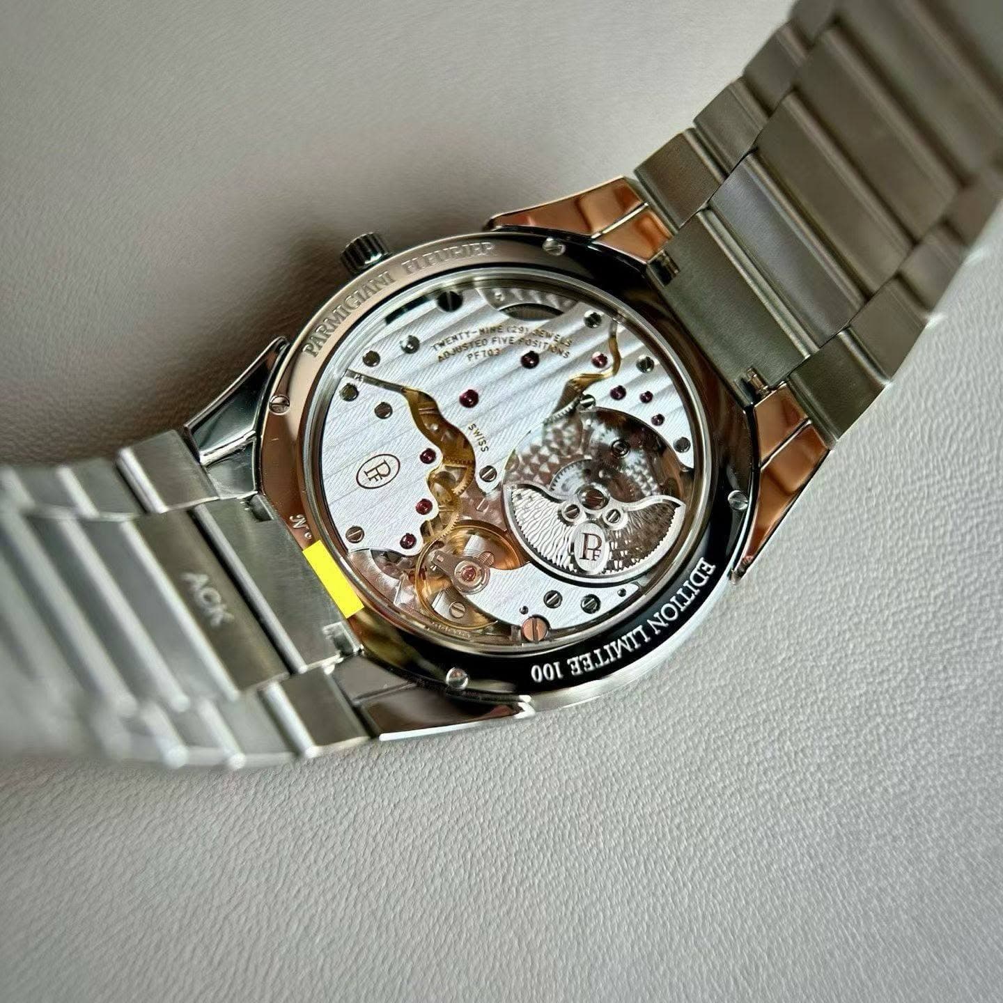 May be an image of wrist watch and text
