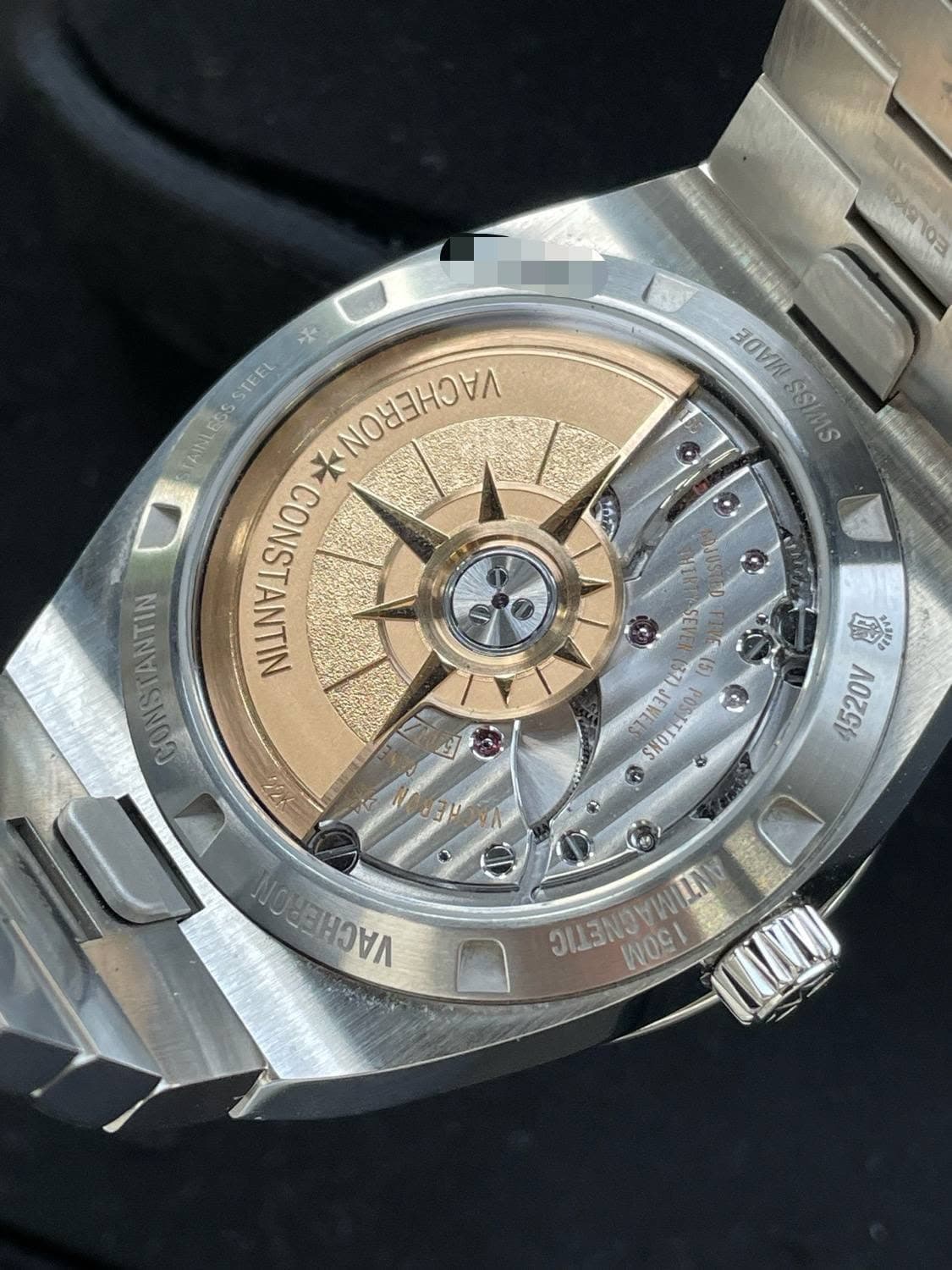 May be an image of wrist watch and text