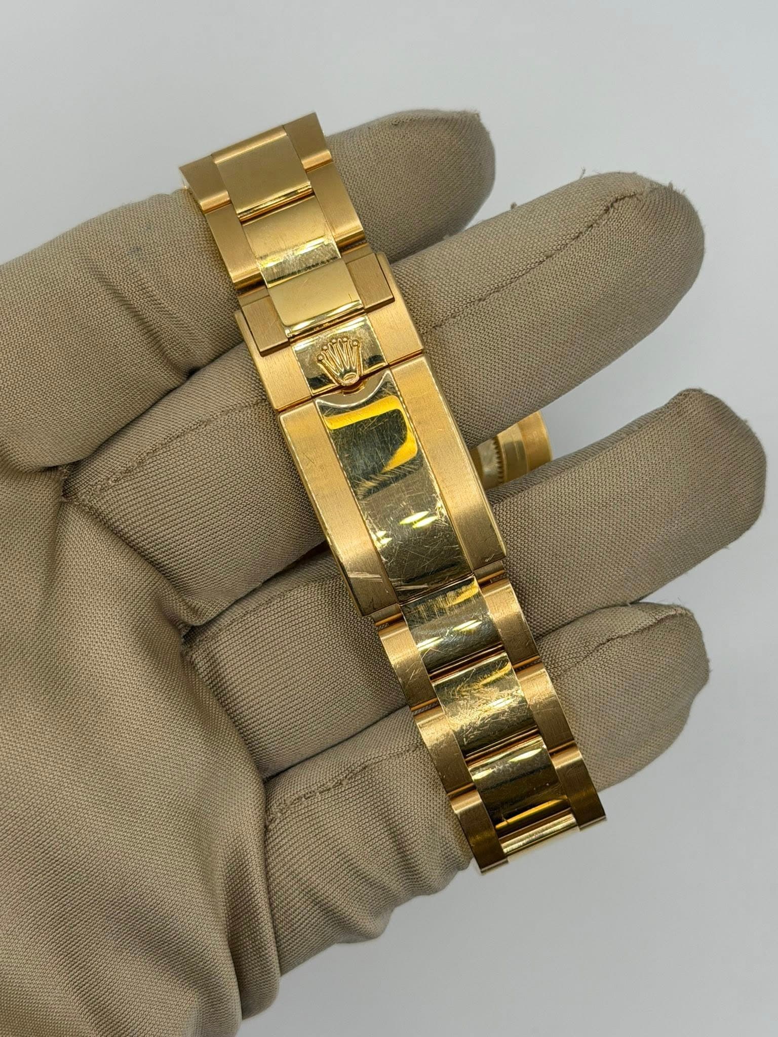 May be an image of wrist watch, jewelry and text