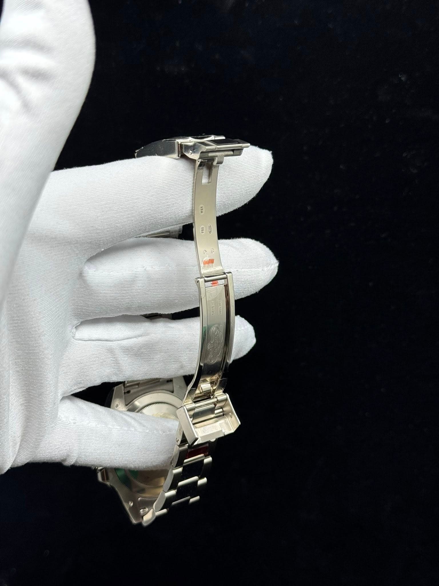 May be an image of wrist watch and jewelry