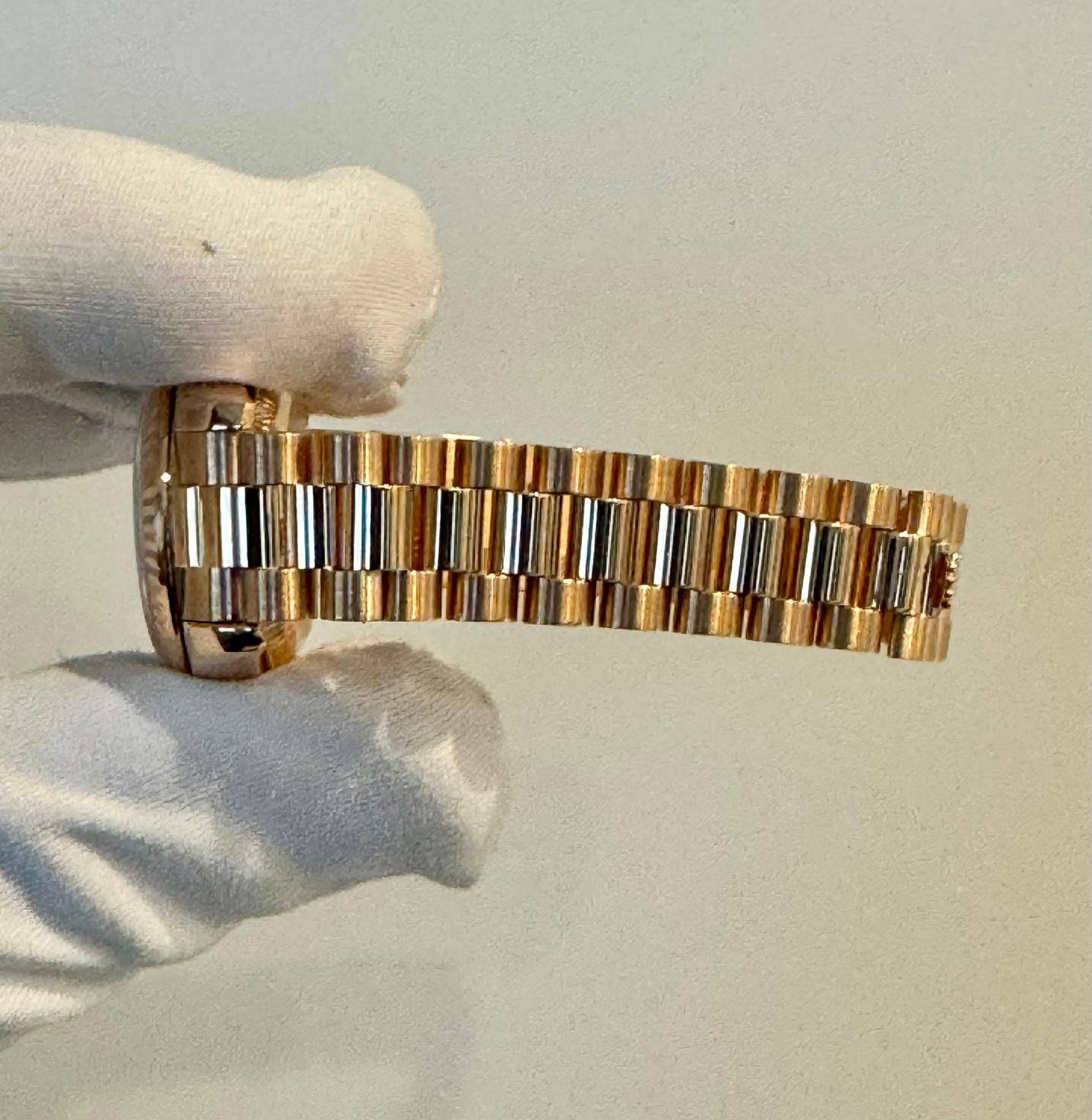 May be an image of wrist watch