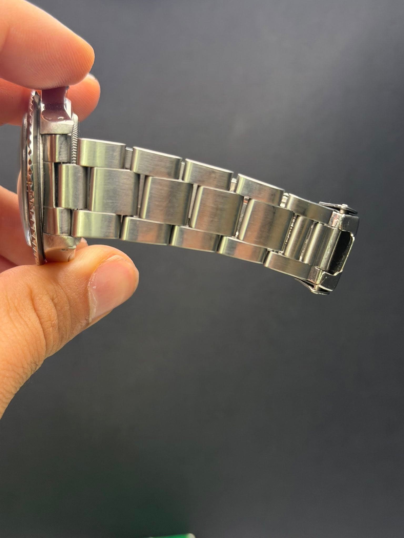 May be an image of wrist watch
