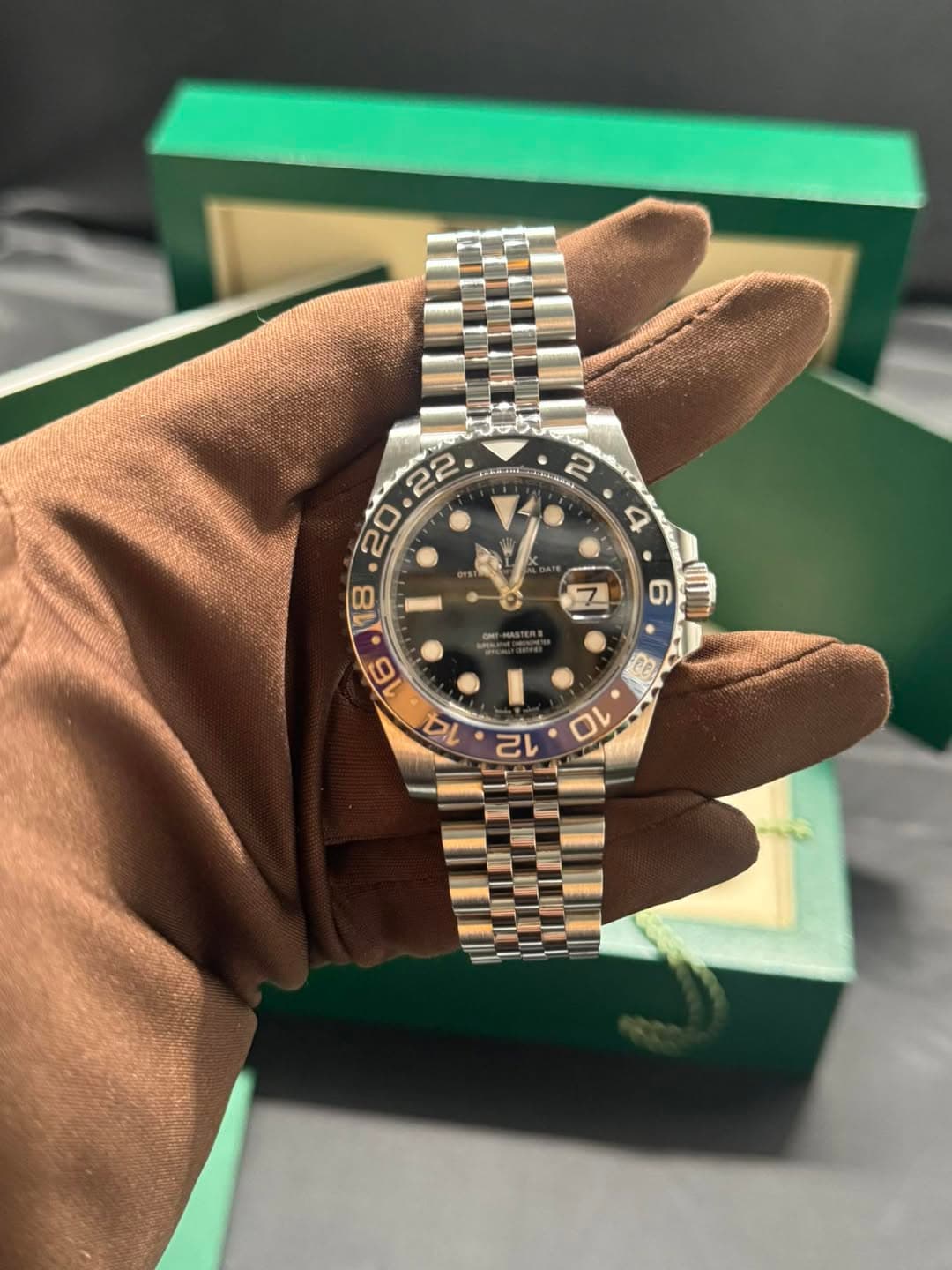 May be an image of wrist watch and text
