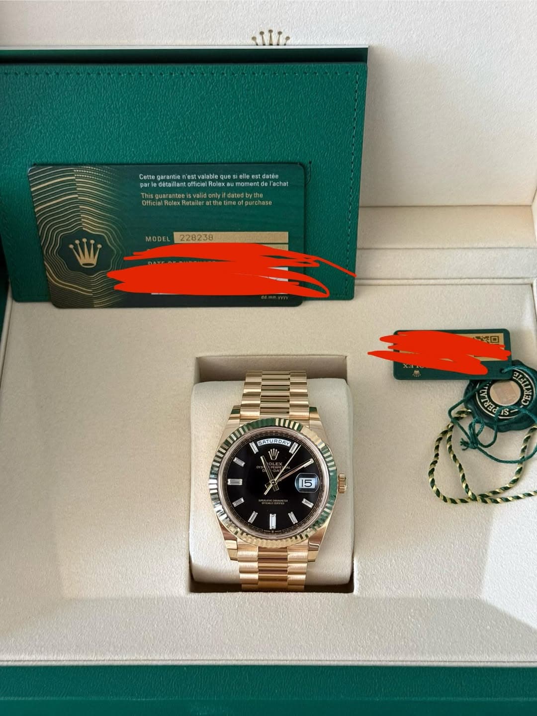 May be an image of wrist watch and text