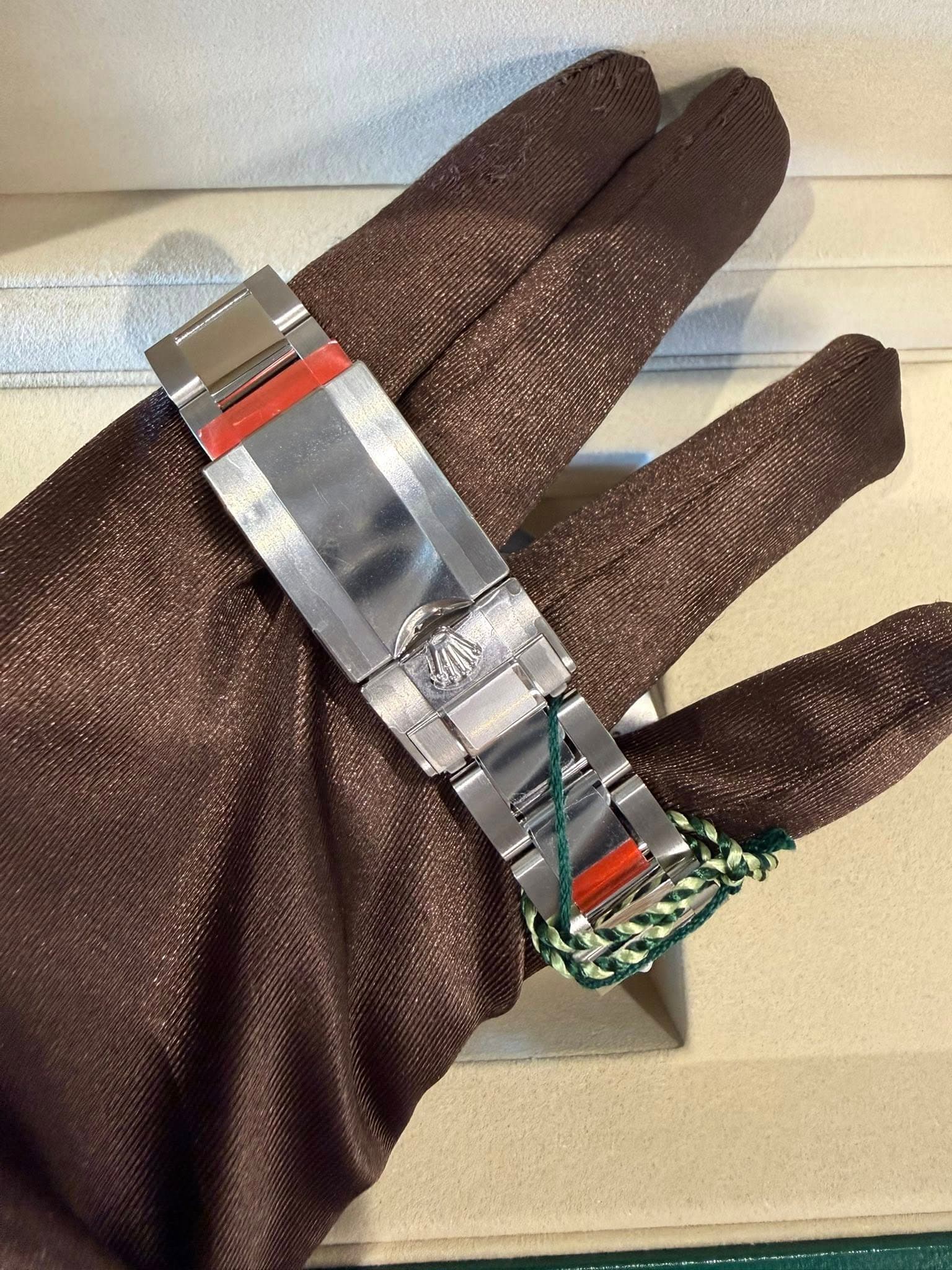 May be an image of digital watch and leather