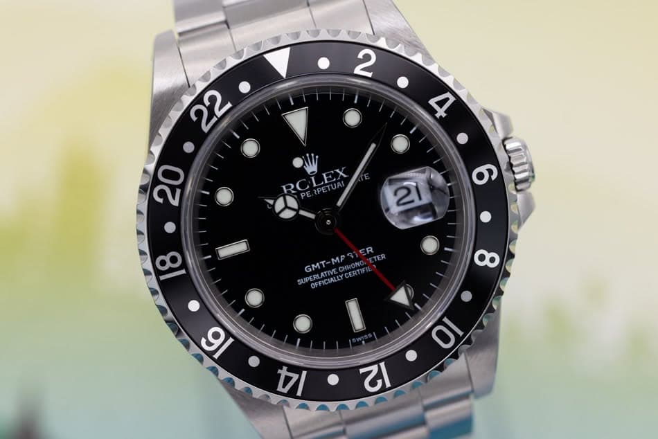 May be an image of wrist watch and text that says ' RCLEX RCLEX 21 6 ഗ്ൾ 18 GMT-MPSIER R GMT-MP PERLATIVE.CHKONO OFFICIALLYCERTIFI SUPERFICIALYCERTIFIE ETER SUPE PERLATIVE…