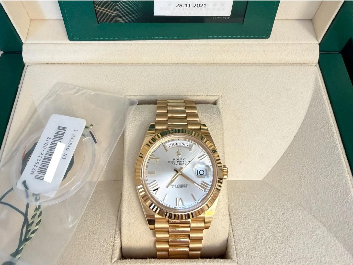 May be an image of wrist watch and text
