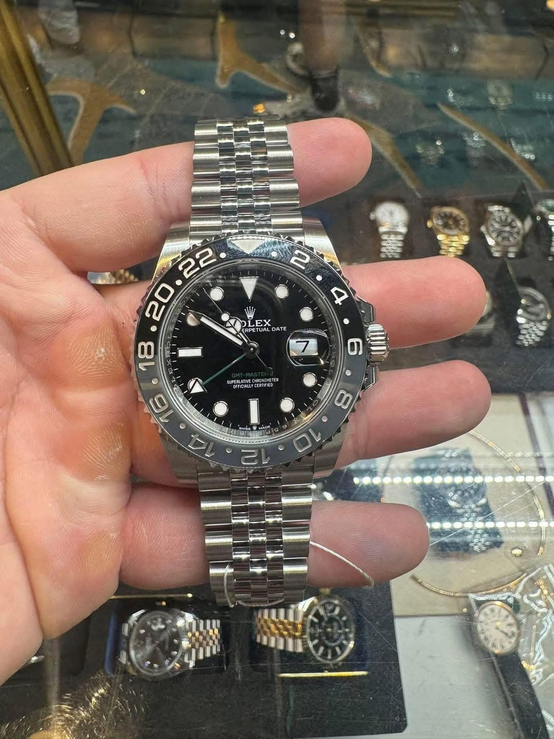 May be an image of wrist watch and text