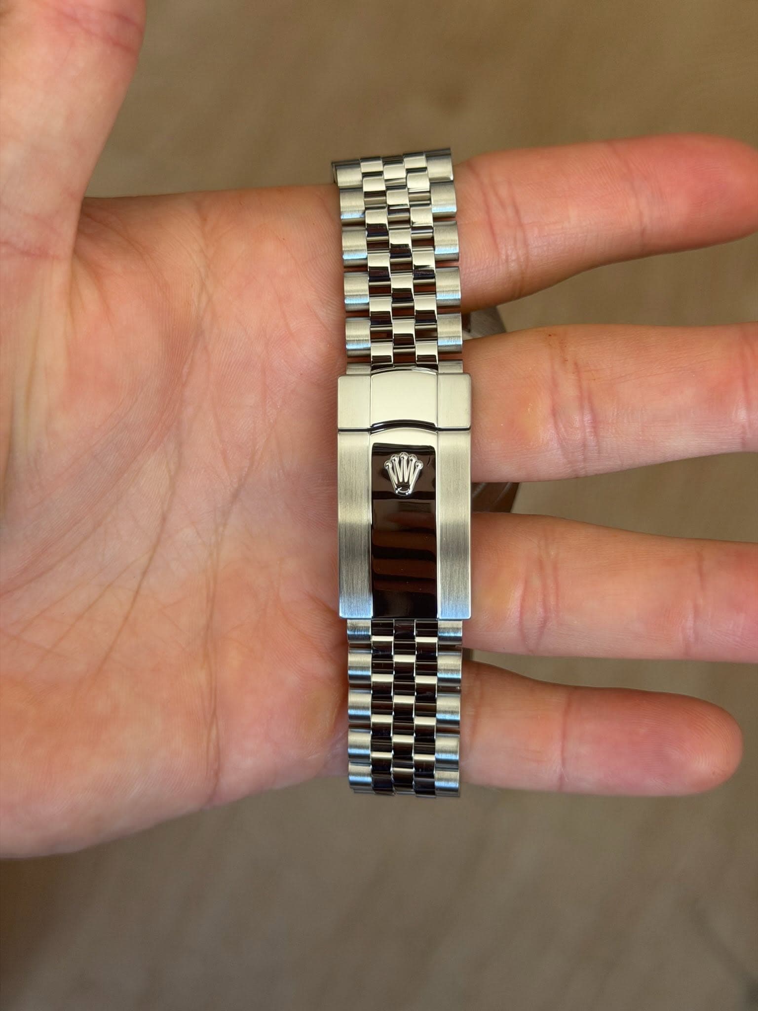 May be an image of wrist watch