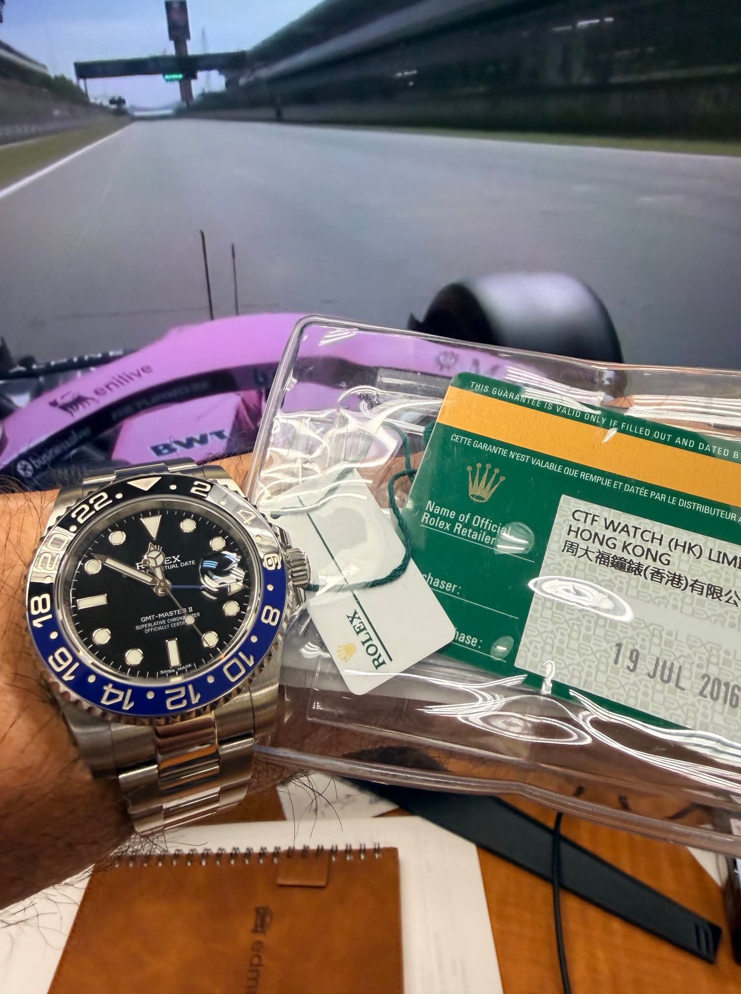 May be an image of wrist watch and text