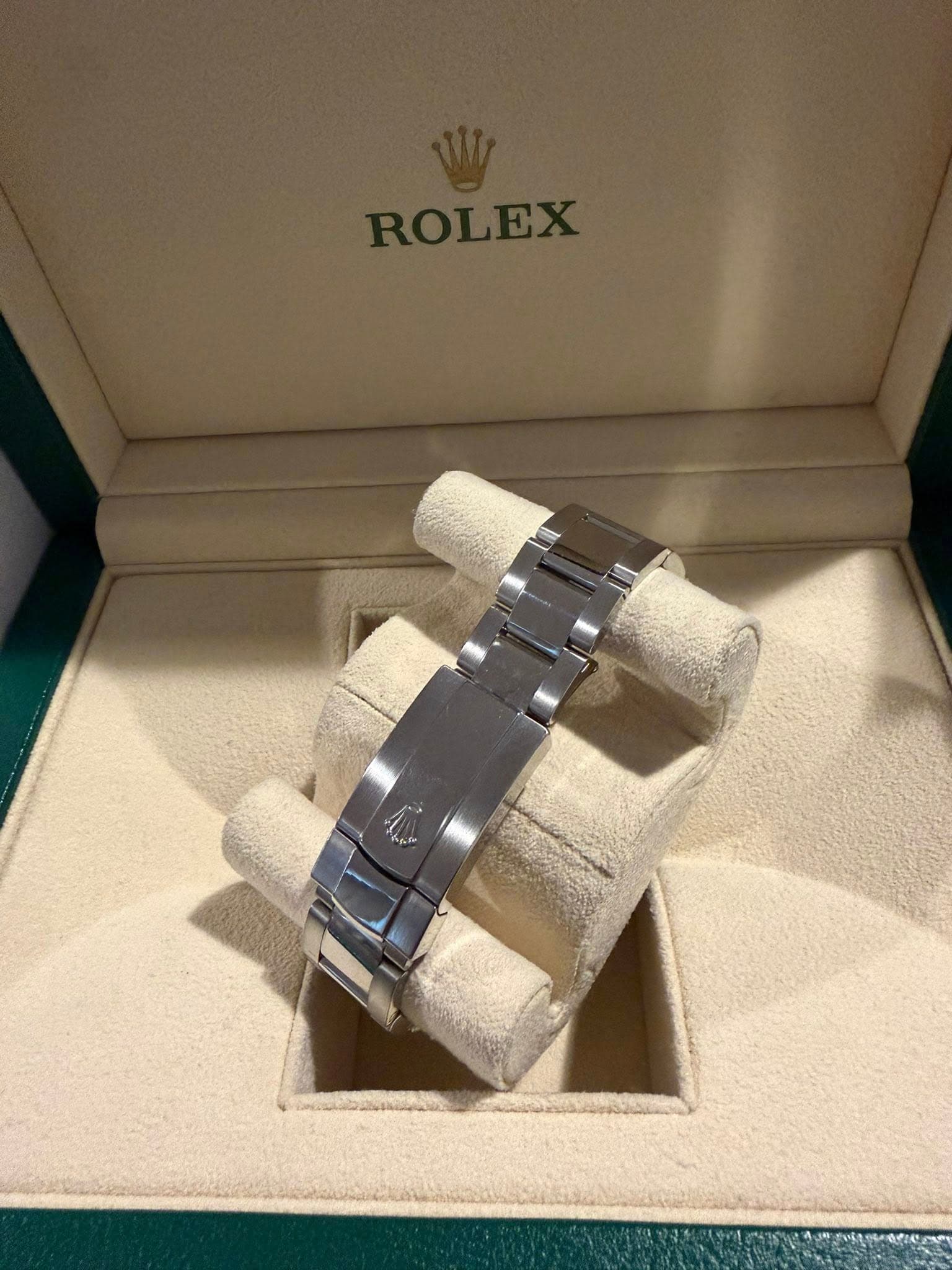 May be an image of wrist watch and text