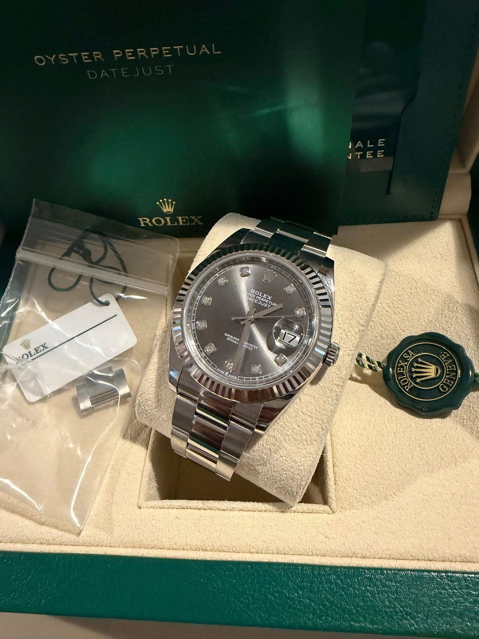 May be an image of wrist watch and text