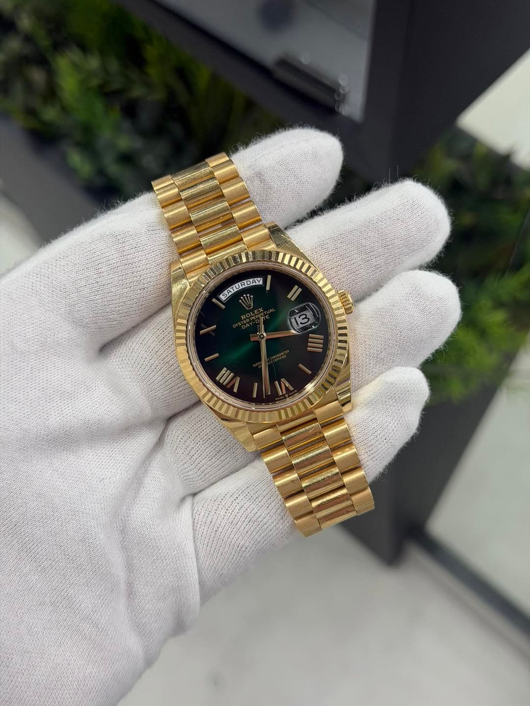 May be an image of wrist watch and text