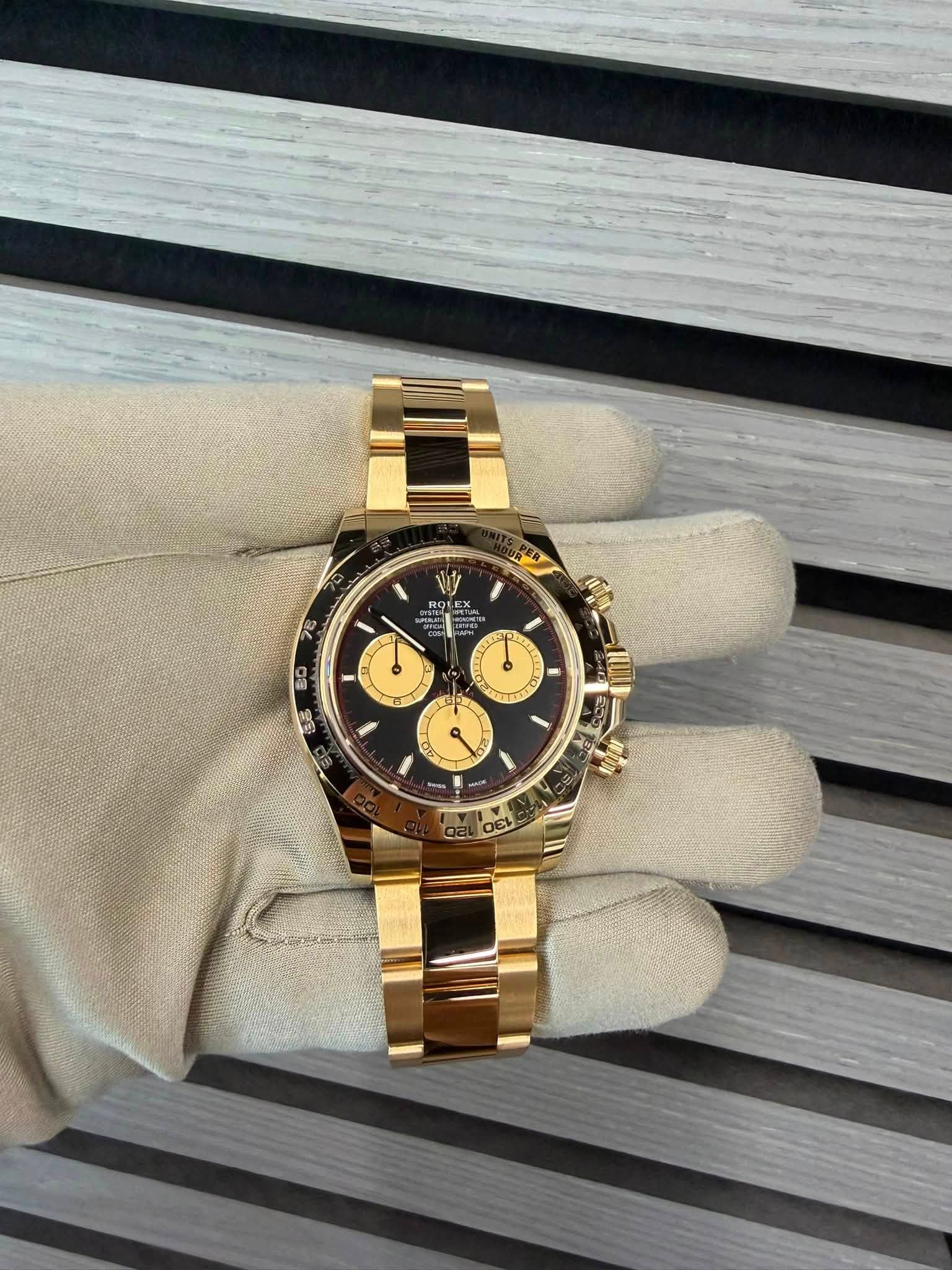 May be an image of wrist watch and text