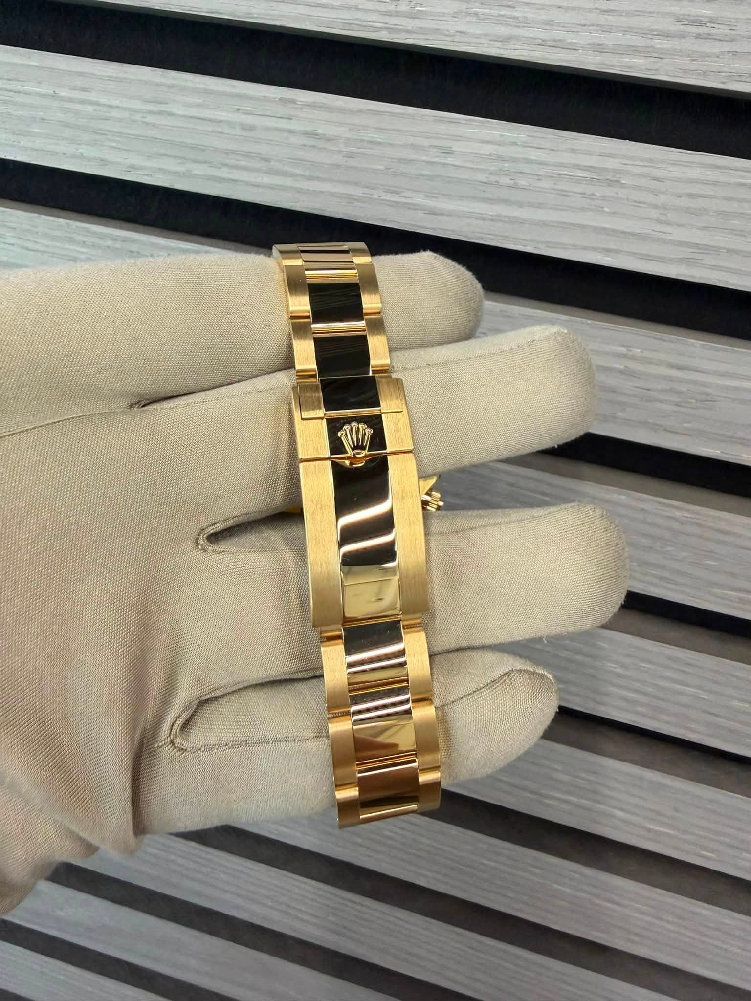 May be an image of jewelry, wrist watch and text that says 'V W'