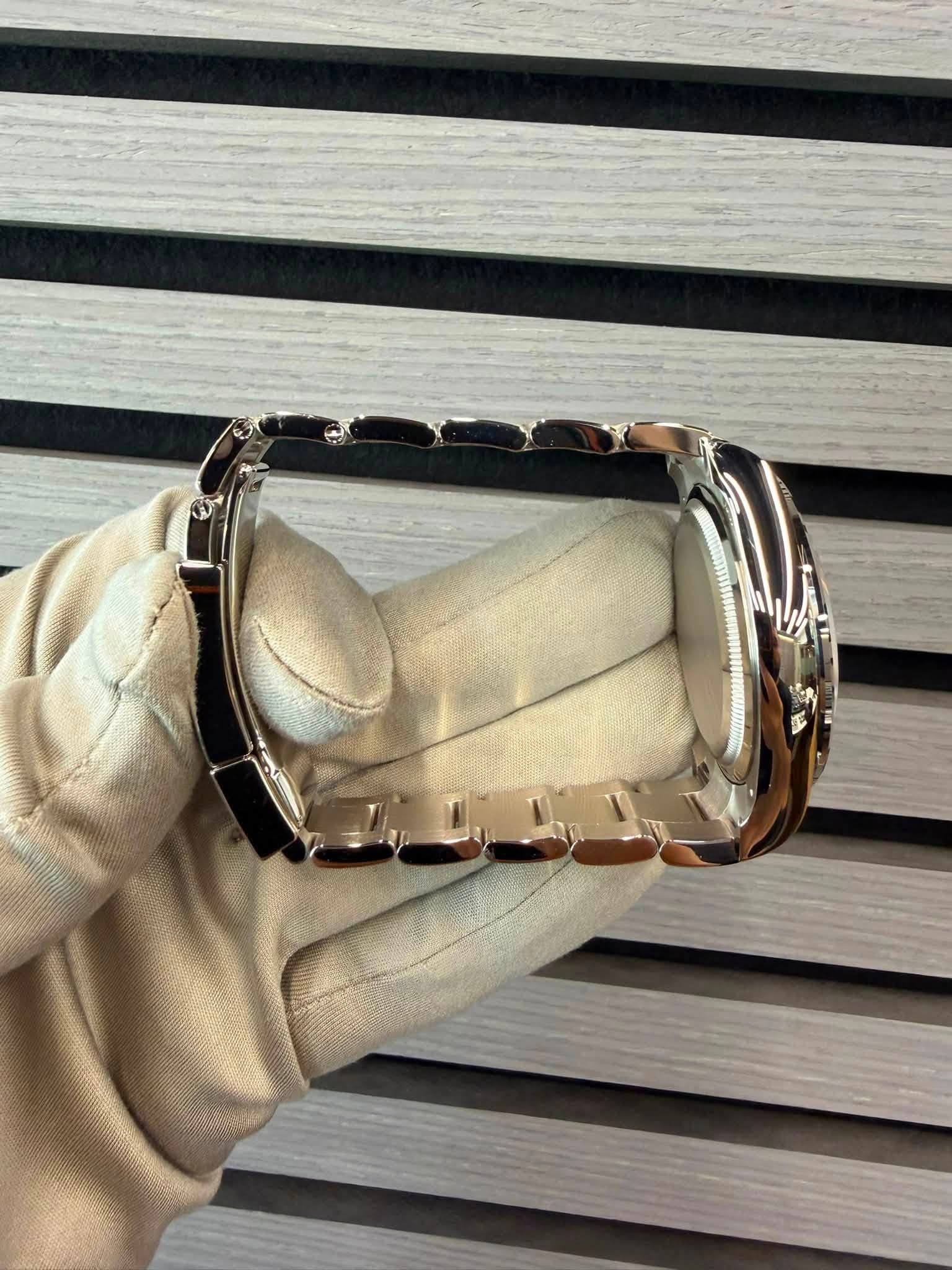 May be an image of wrist watch and jewelry