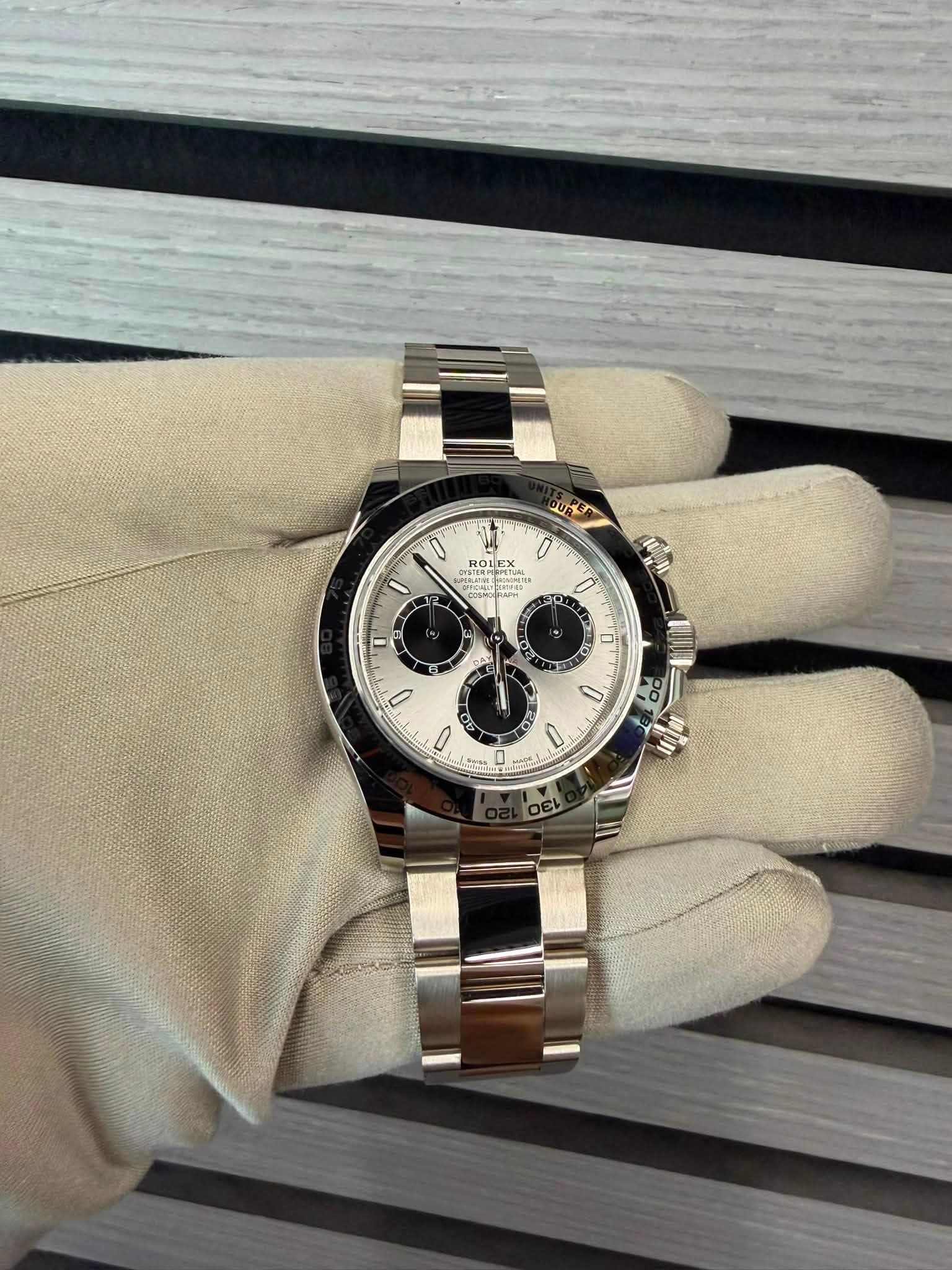 May be an image of wrist watch and text