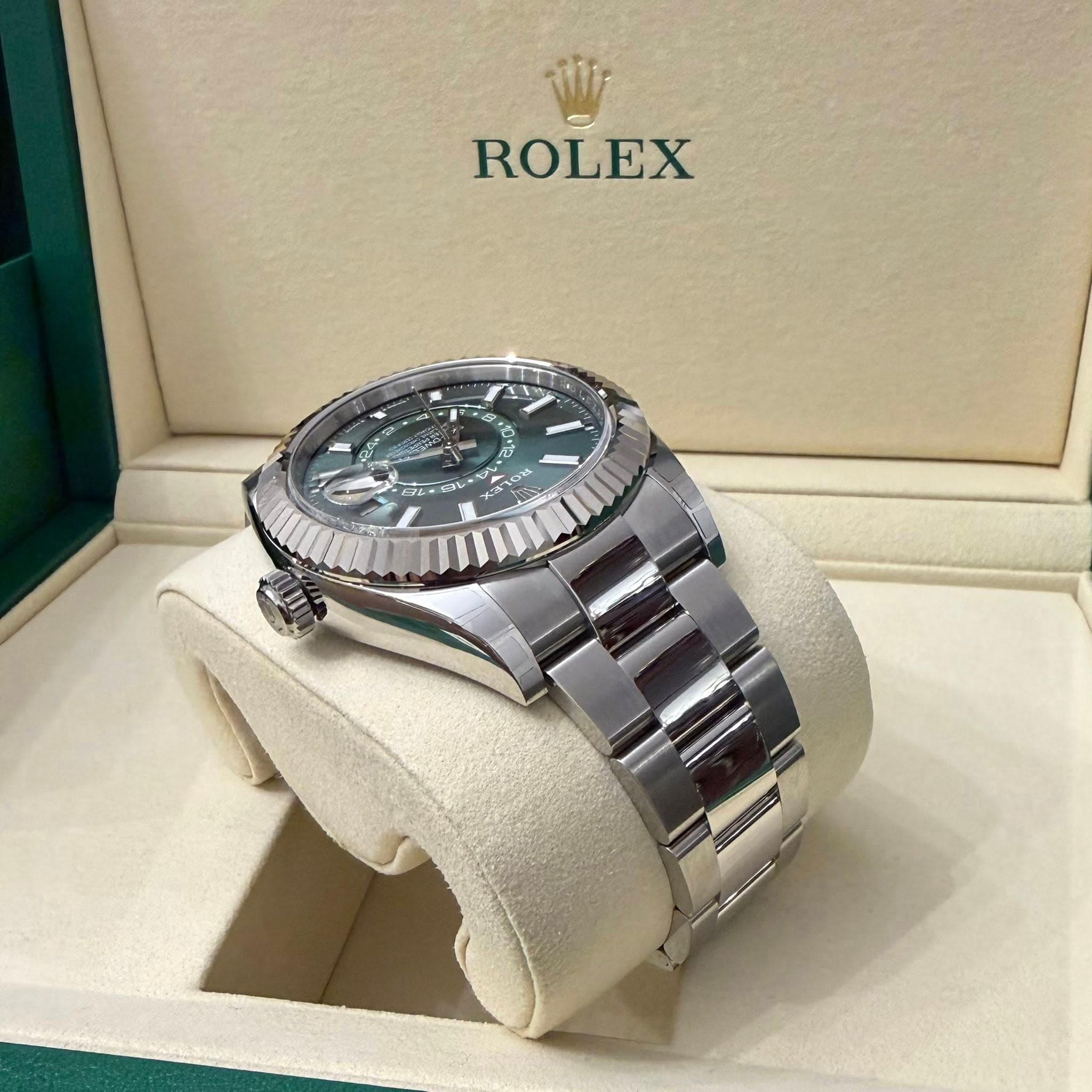 May be an image of wrist watch and text