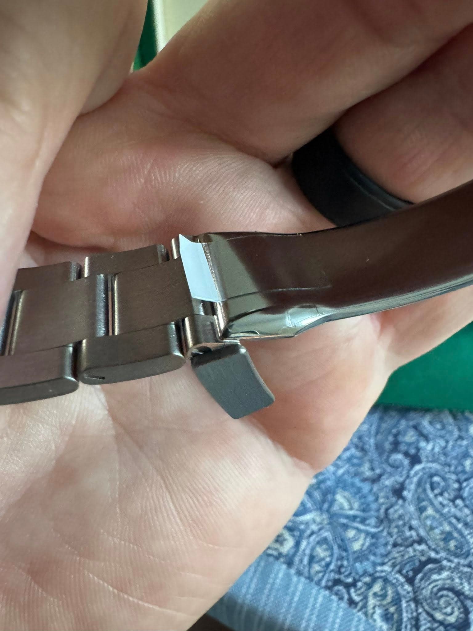May be an image of wrist watch