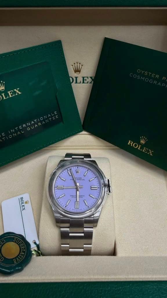May be an image of wrist watch and text that says 'W DLE LEX LEX ROL OLEX ١ ROLEX Me RO PA II'
