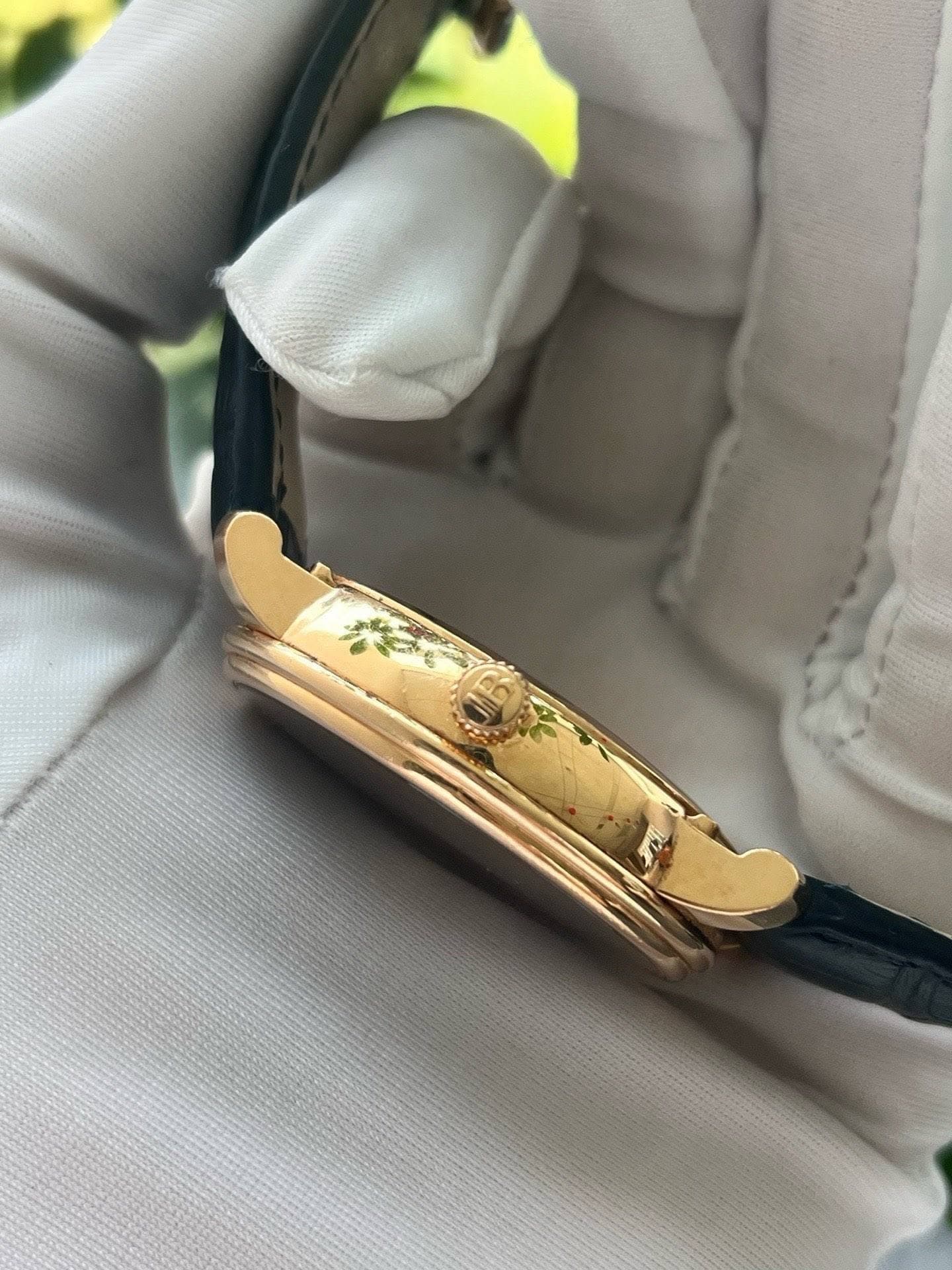 May be an image of wrist watch