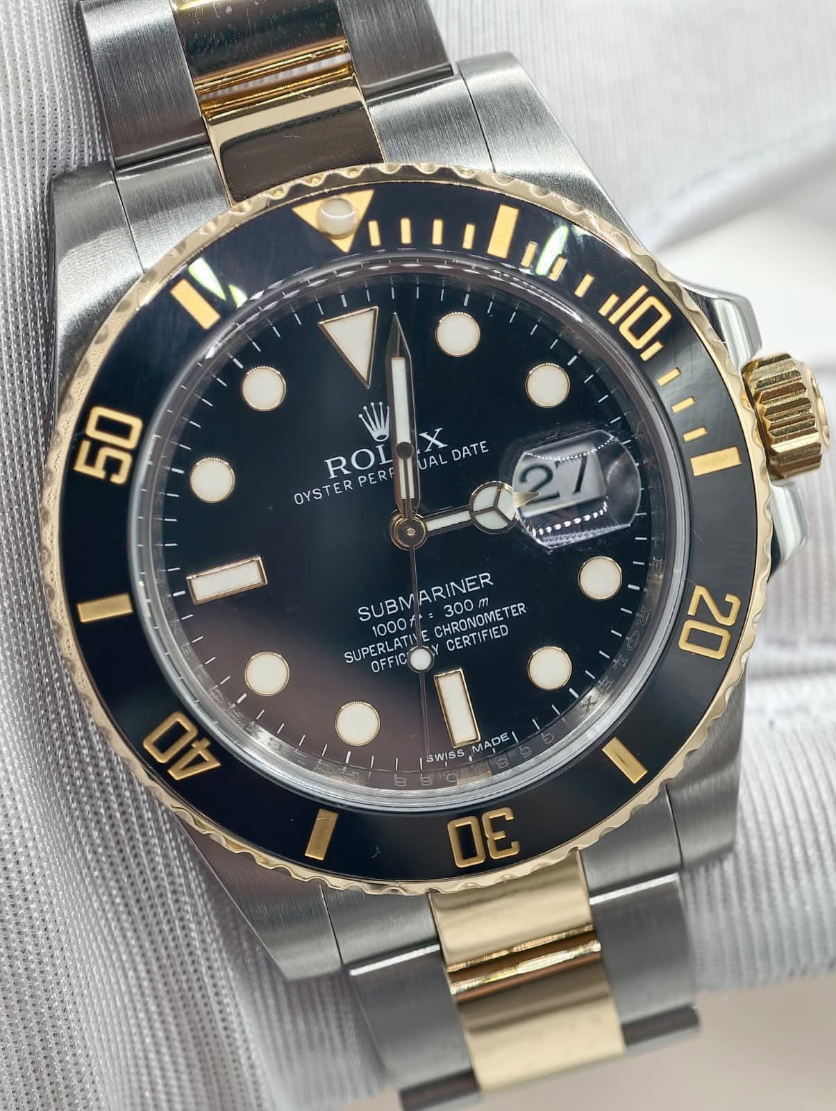 May be an image of wrist watch and text that says 'I 10 50 ROI OYSTERPER ROLOX PER UAL UALDATE DATE OYSTER 2 100I SUBMARINER SUBM SUPERLATI 000f SUPERLATIVECHRONOMETER…