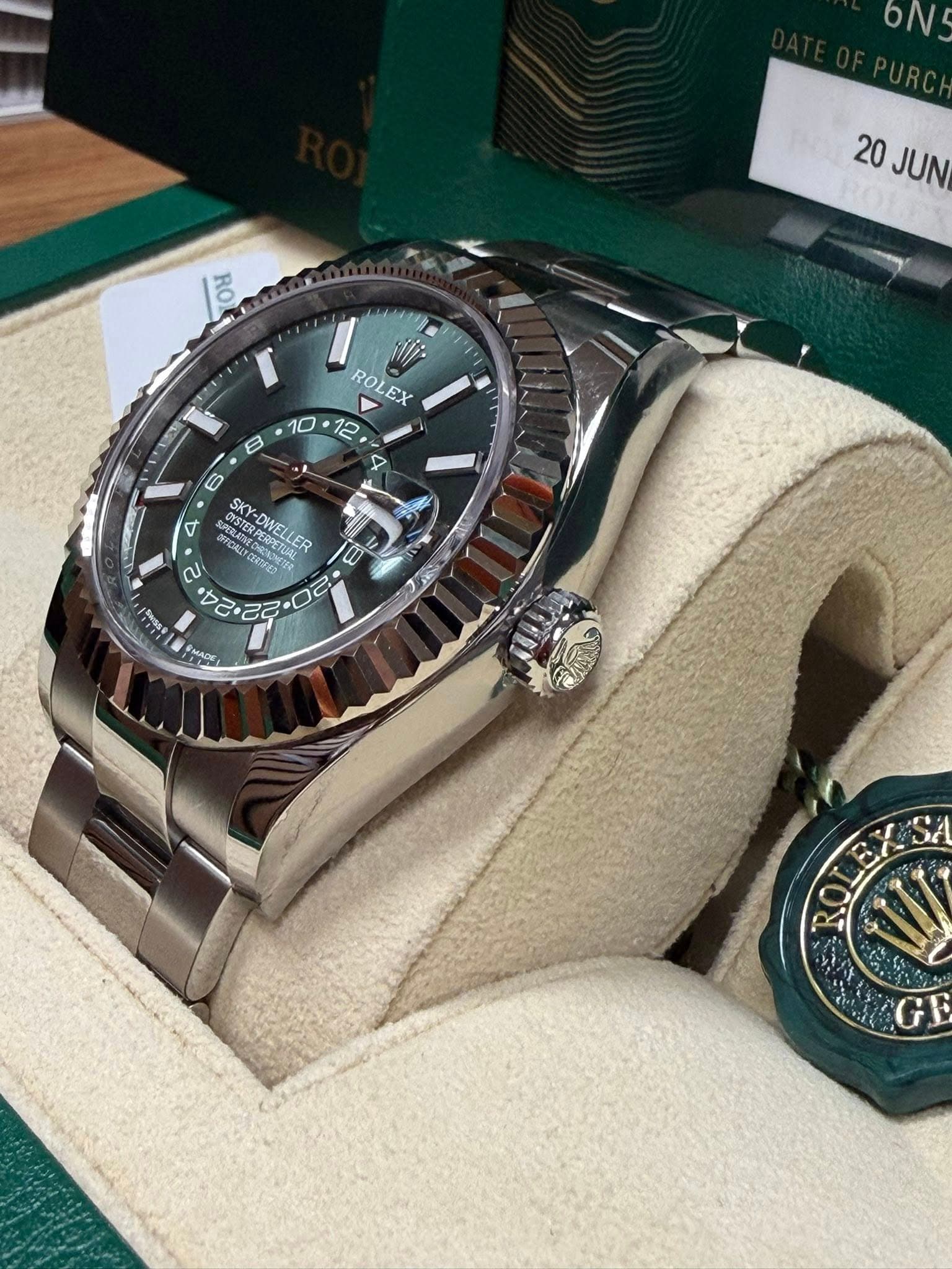 May be an image of wrist watch and text