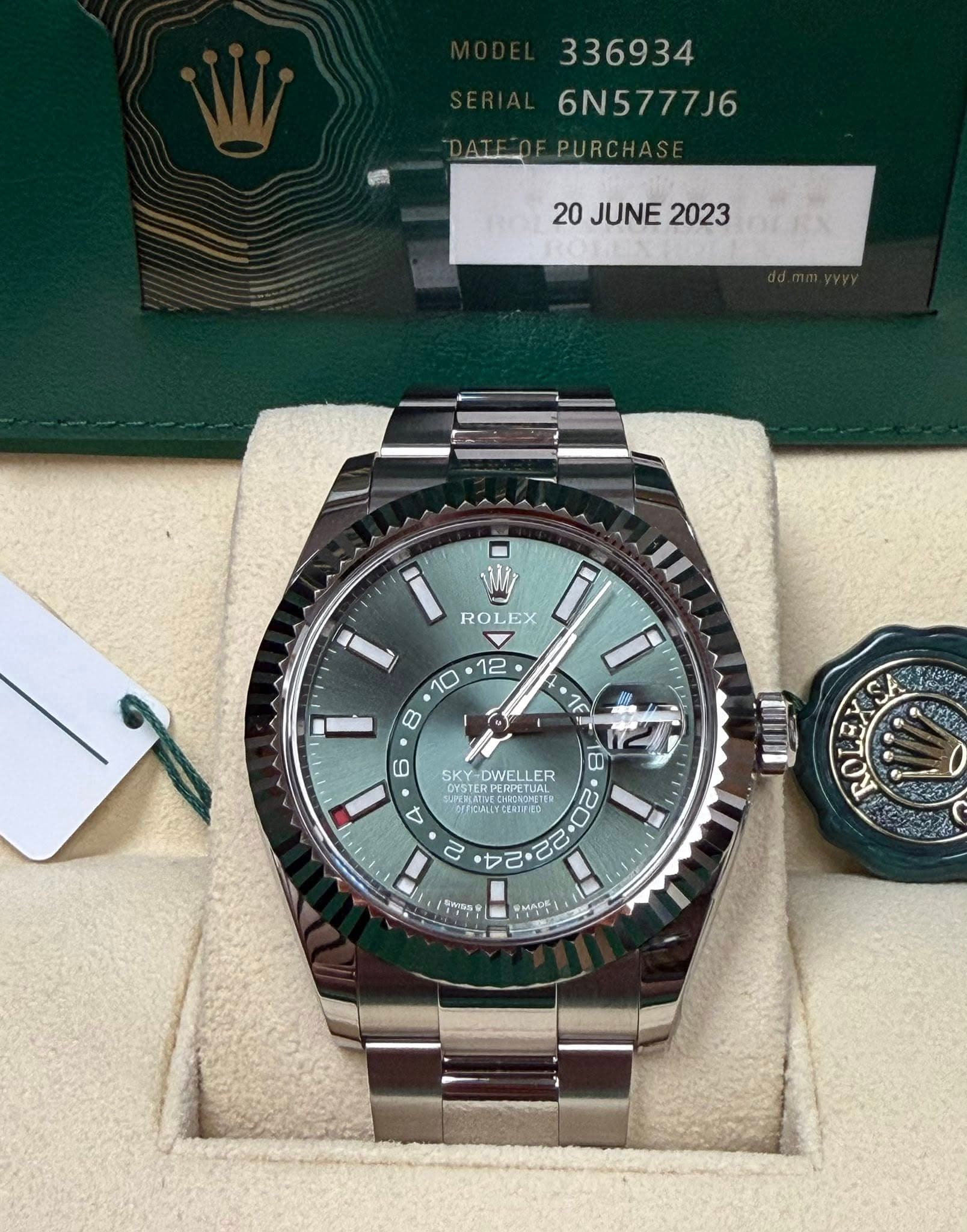May be an image of wrist watch and text